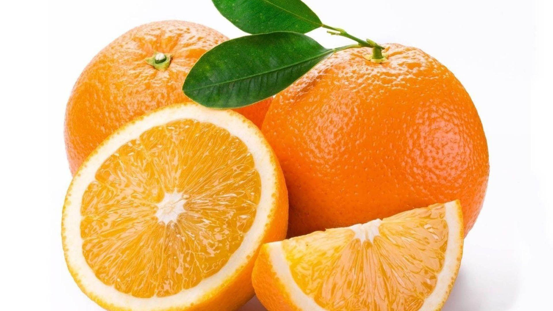 simple orange fruit, vibrant whole and sliced oranges, fresh green leaves, Full HD Desktop Wallpaper