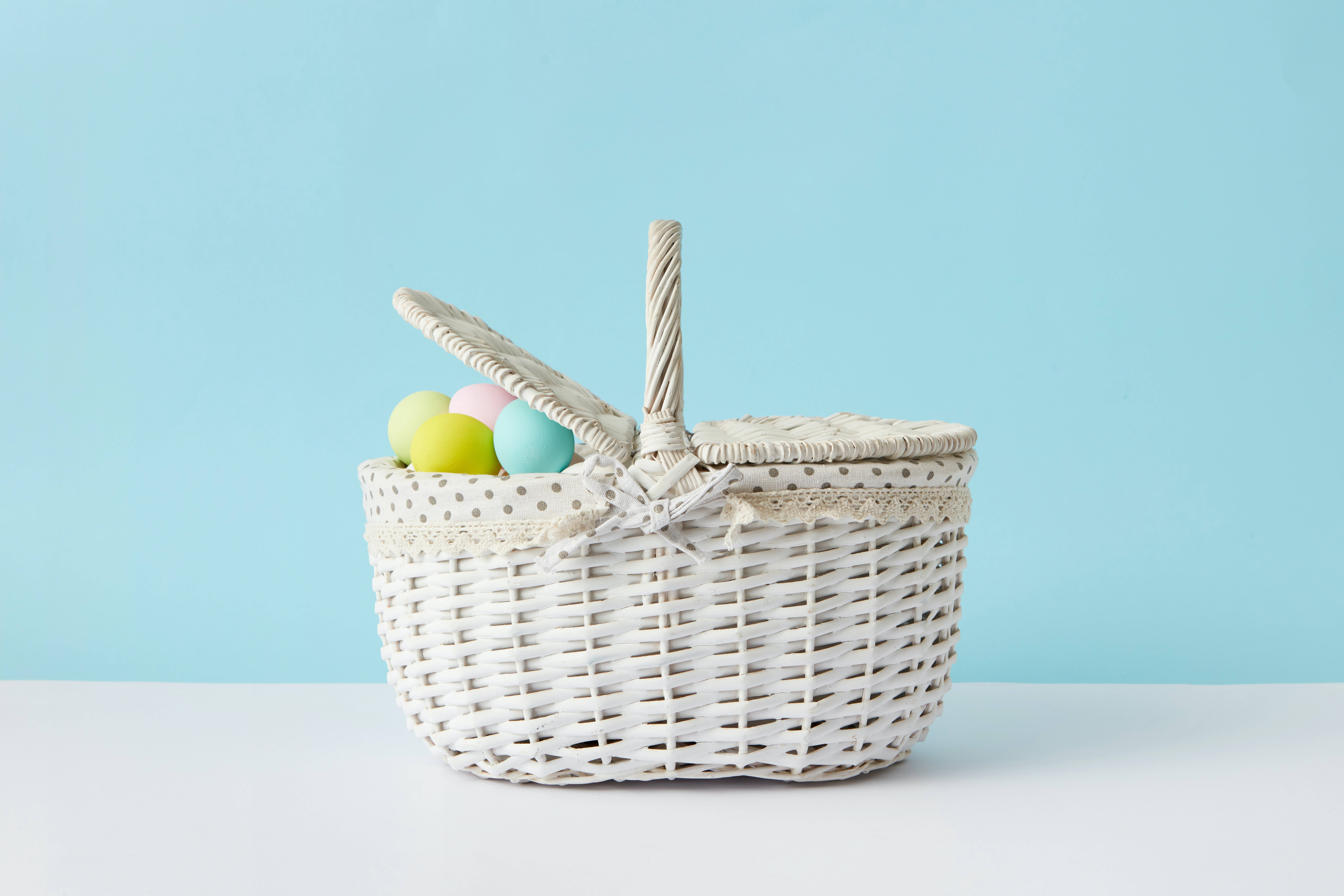 white woven picnic basket, lace trim, pastel Easter eggs, 8K Desktop Wallpaper