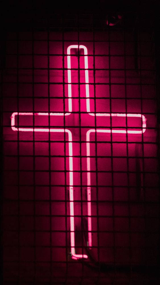 glowing pink neon cross, dark grid fence, dimly lit setting, SD Phone Wallpaper