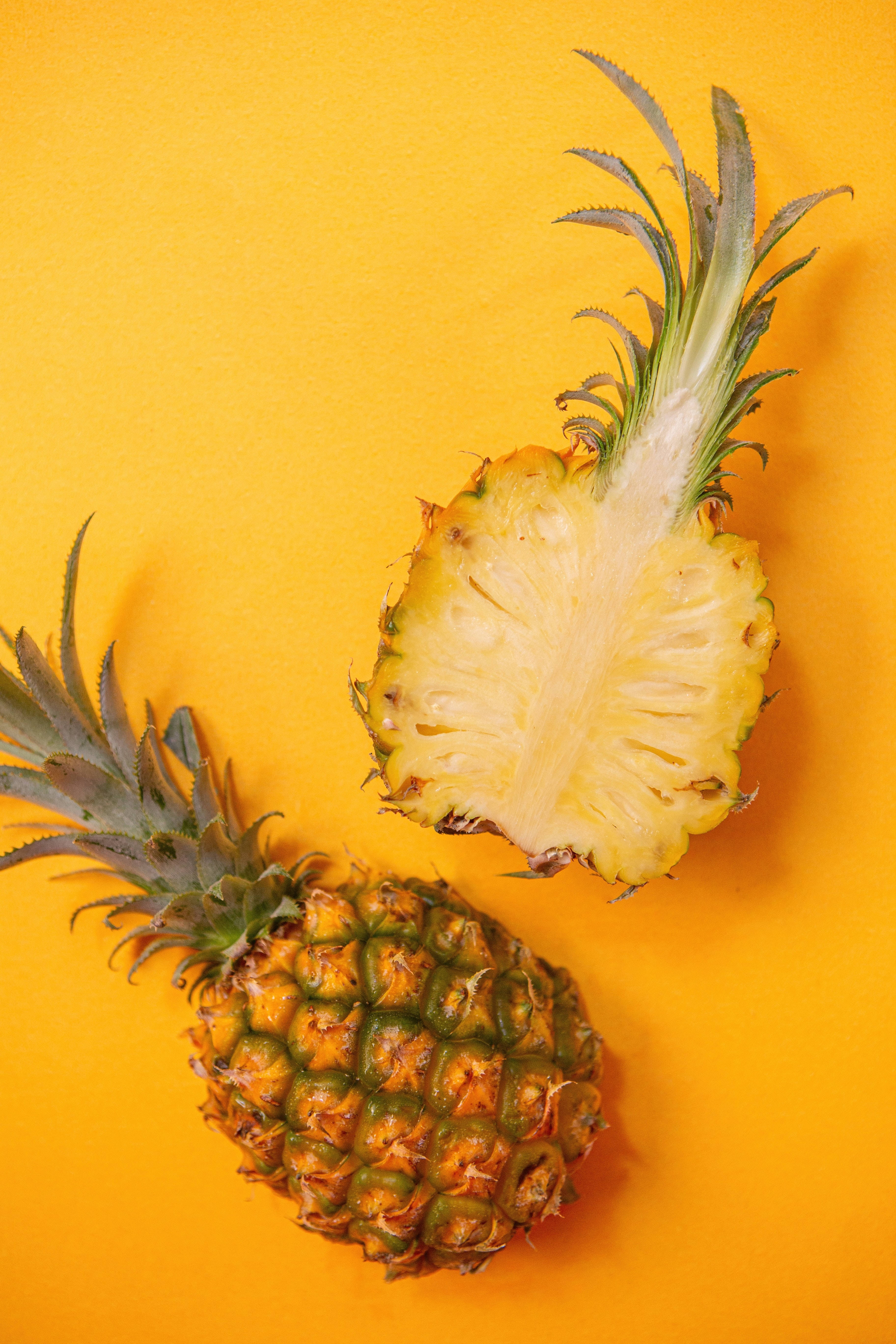 sliced pineapple, bowl of sunshine, vibrant yellow background, 5K Phone Wallpaper