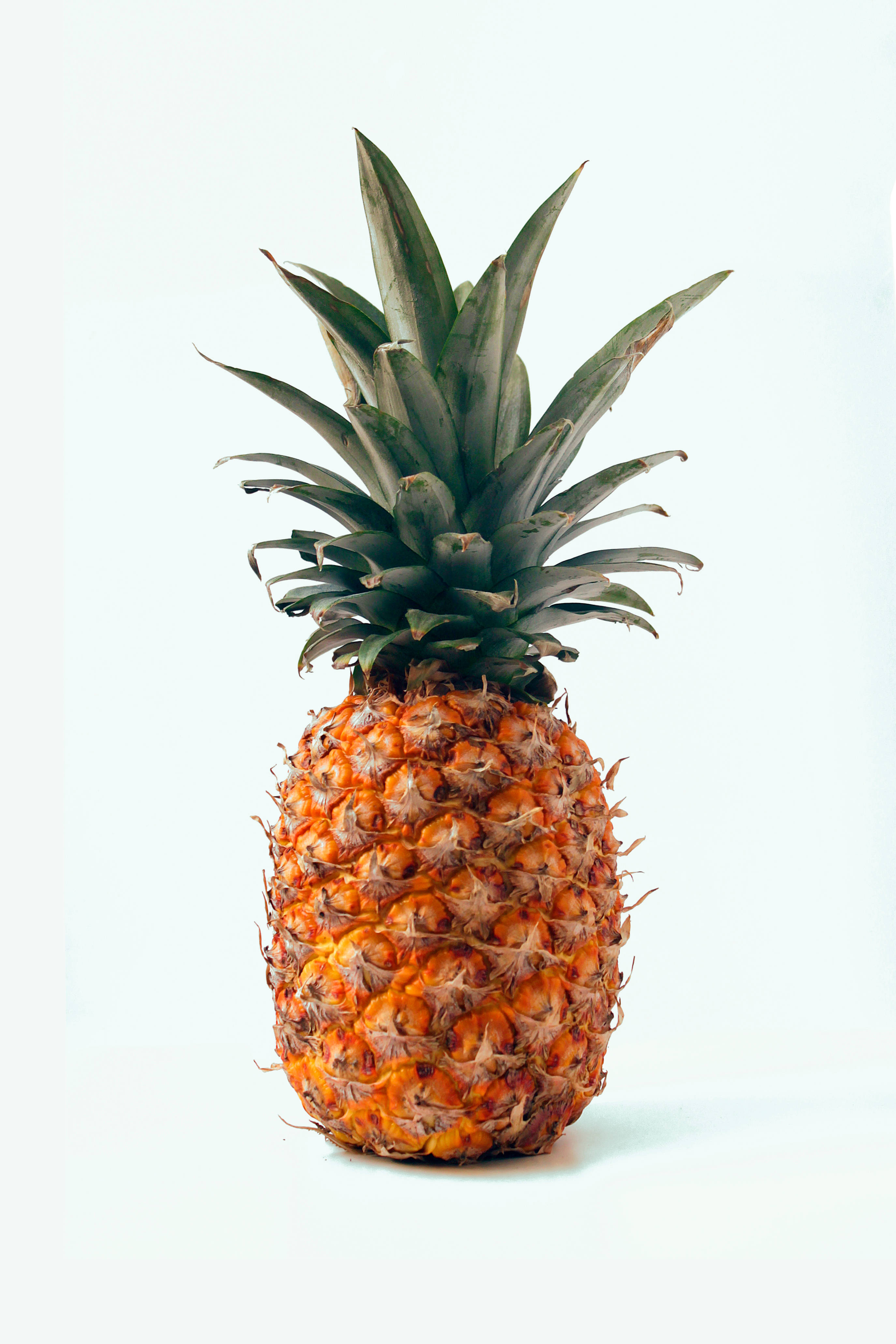 pineapple fruit, yellow body, spiky green crown, 4K Phone Wallpaper