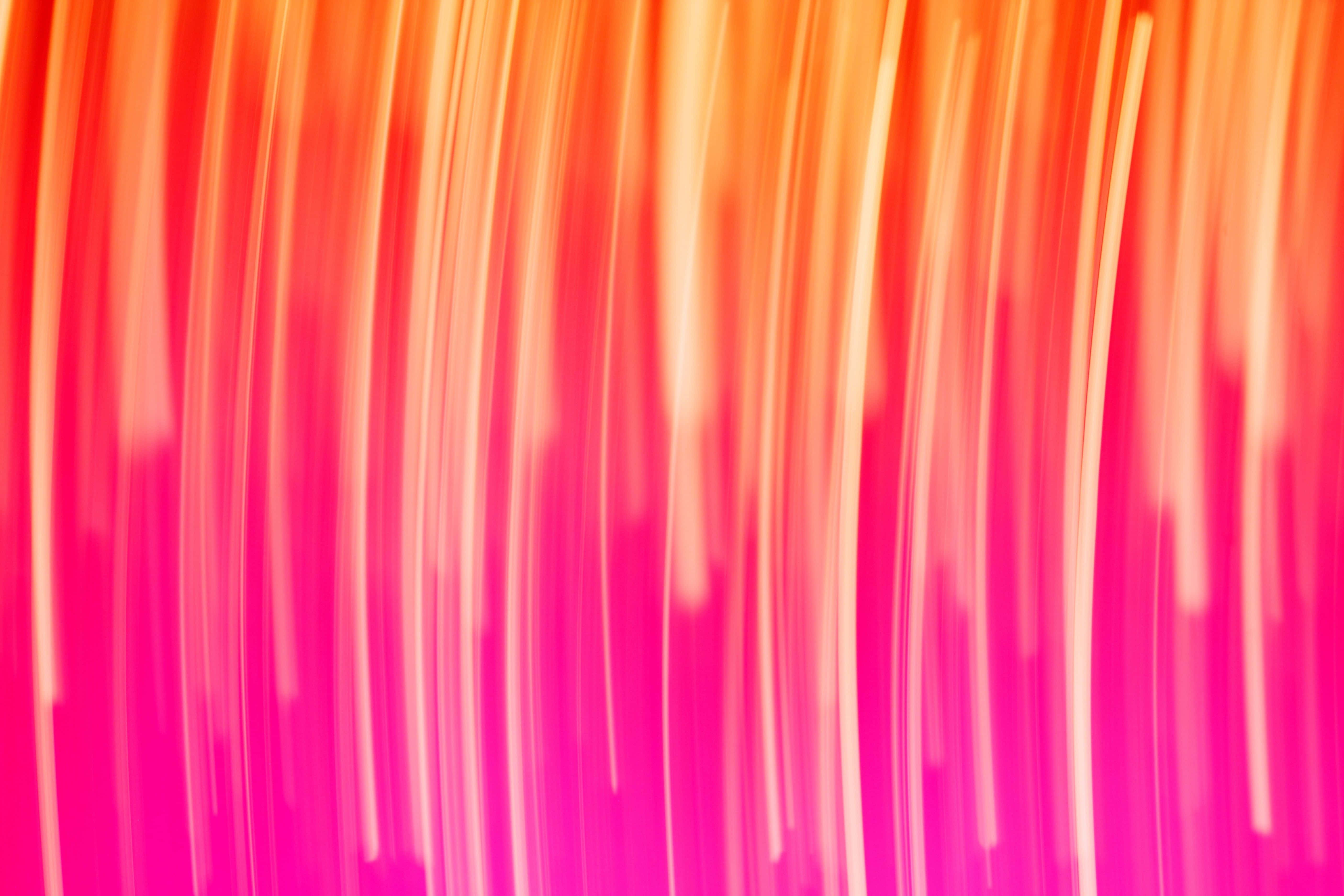 vibrant pink orange gradient, blurred vertical streaks, fiery orange, 5K Desktop Wallpaper