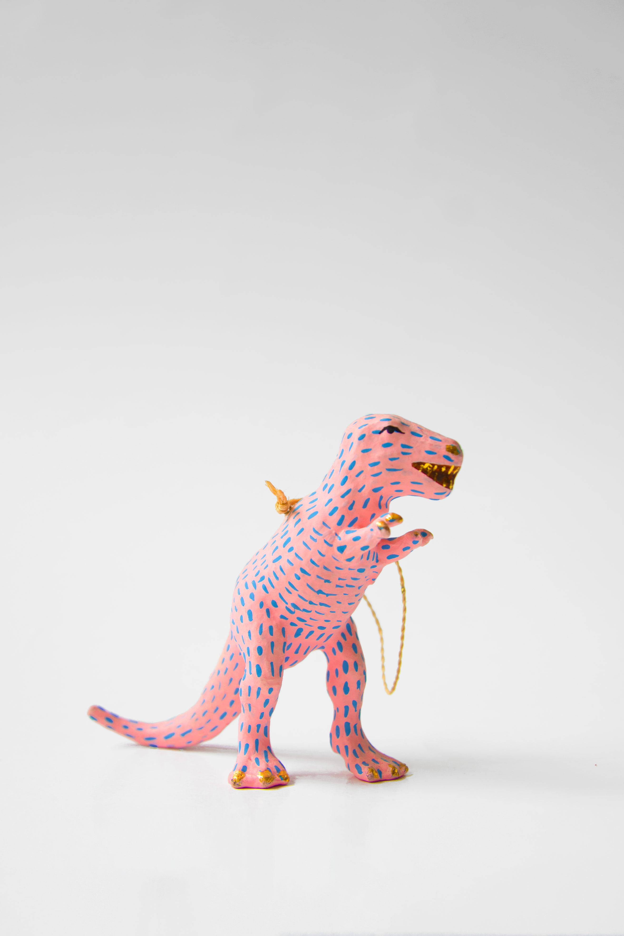 pink dinosaur, blue spots, gold accents, 4K Phone Wallpaper