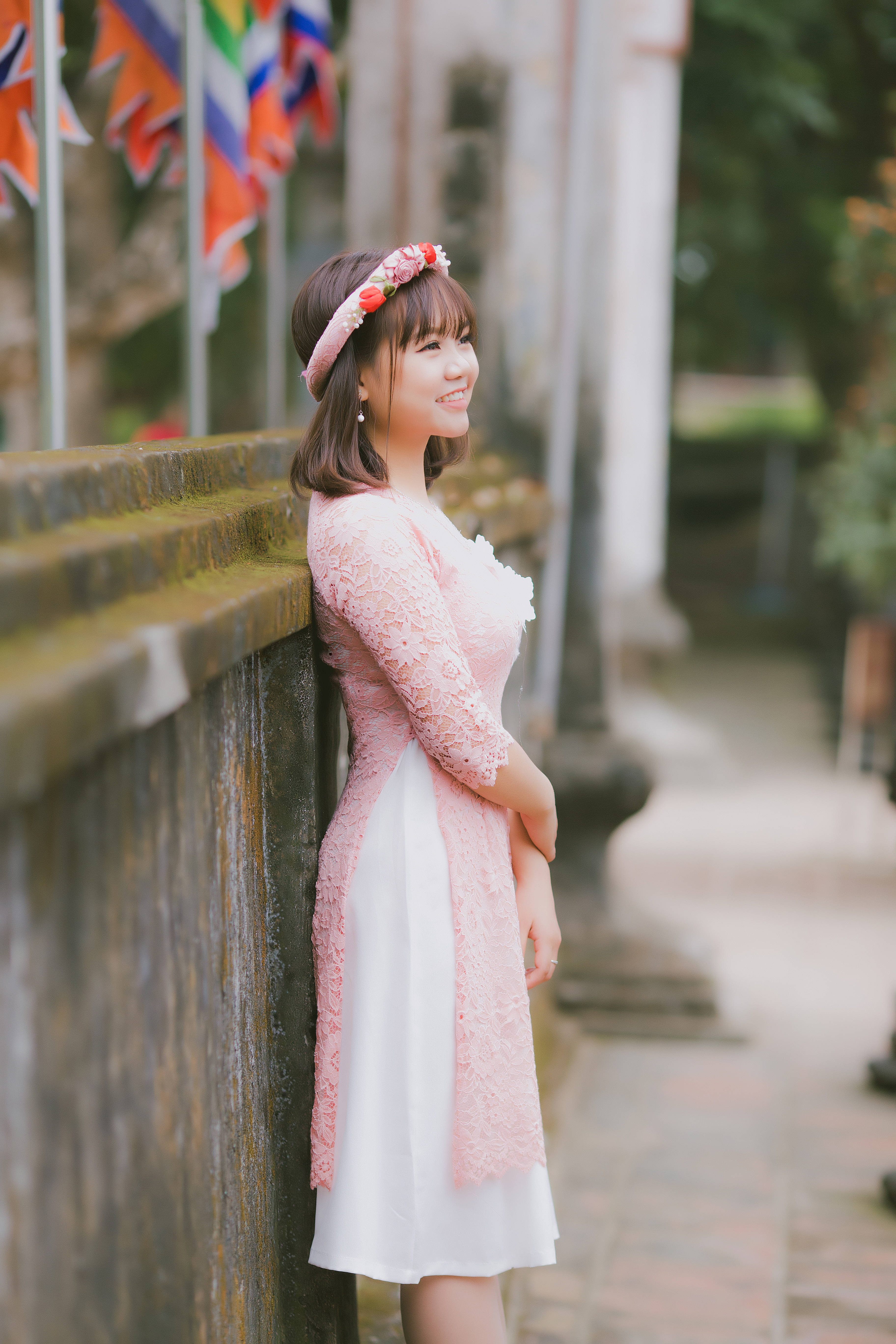pink lace dress, stone wall, soft daylight, 5K Phone Wallpaper