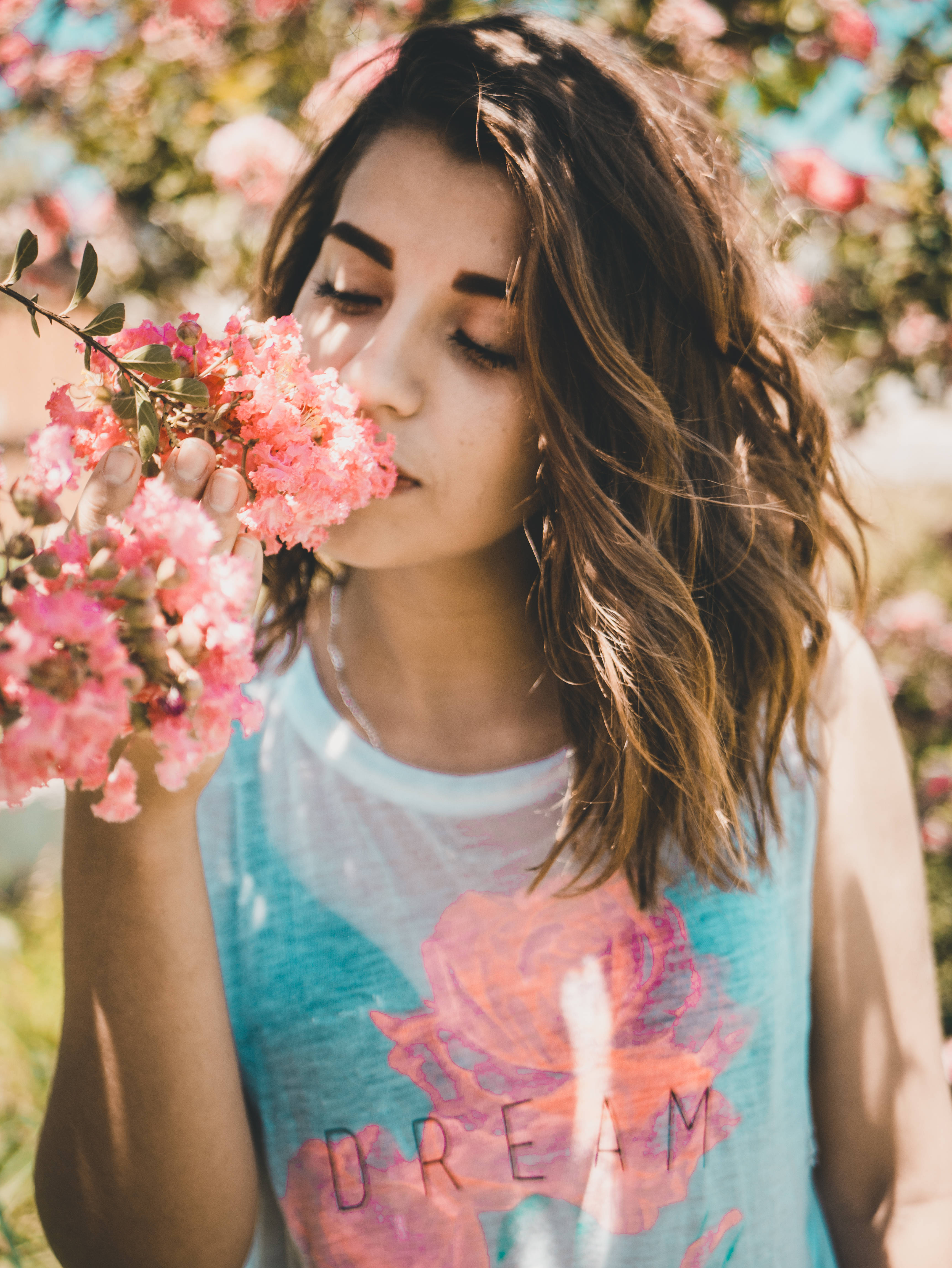 cute girl, pink flowers, wavy brown hair, 4K Phone Wallpaper