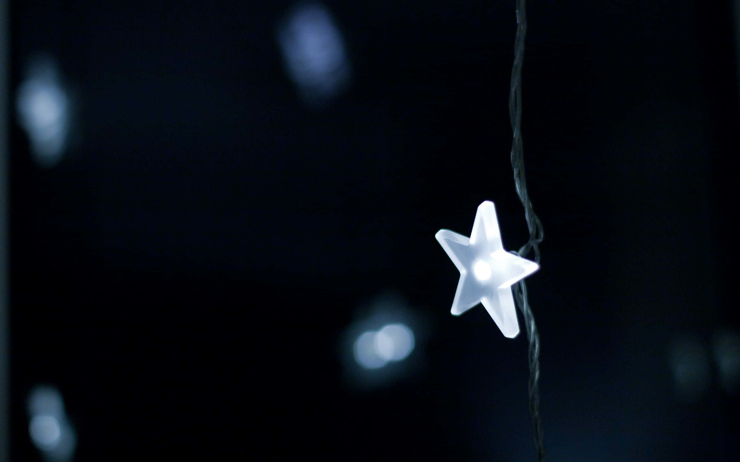 Cute Stars, glowing white star-shaped light, dark background, 2K Desktop Wallpaper