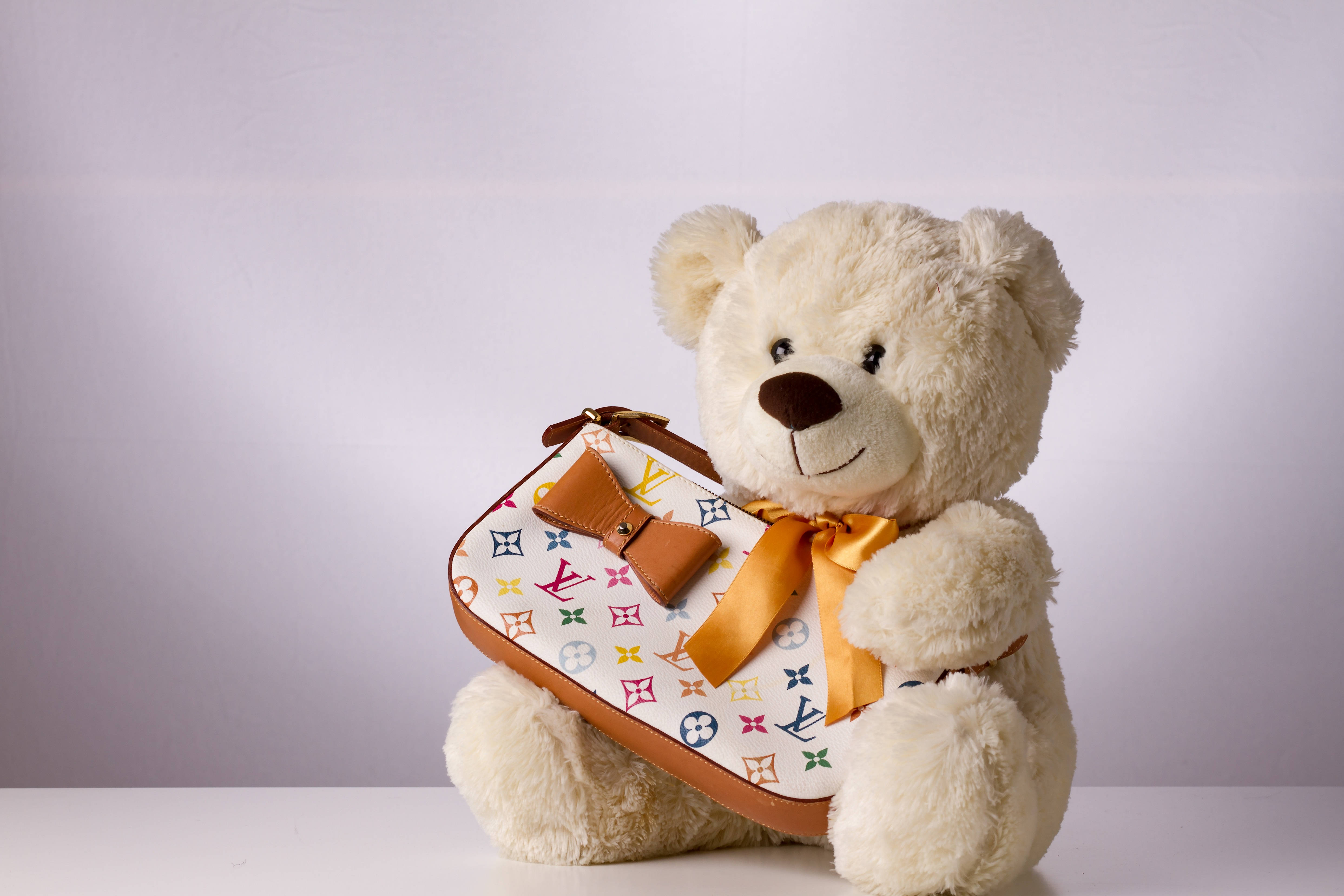 cute teddy bear, colorful monogrammed handbag, golden bow, 4K Desktop Wallpaper