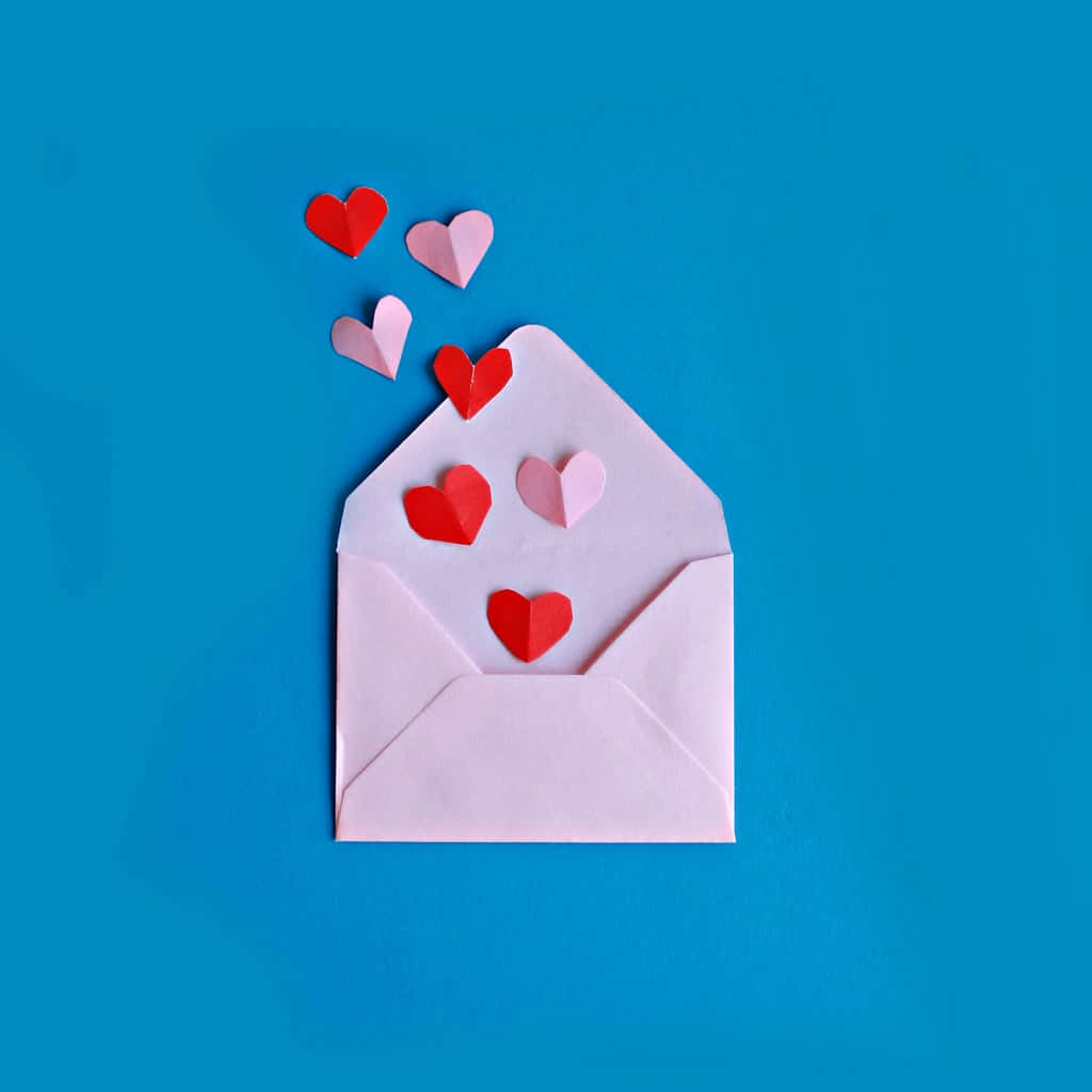 Cute Valentines Day Love Letter Envelope, light pink envelope, vibrant blue background, SD Desktop Wallpaper