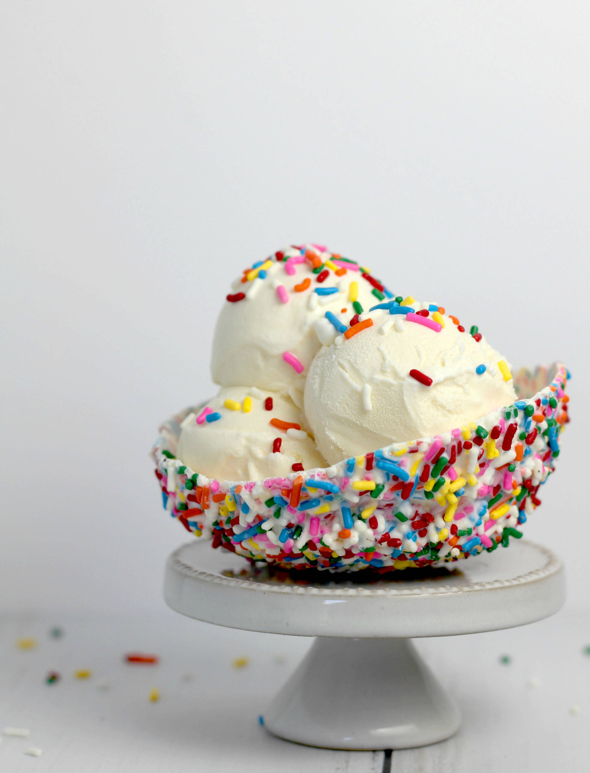 vanilla ice cream, colorful sprinkles, white cake stand, 2K Phone Wallpaper