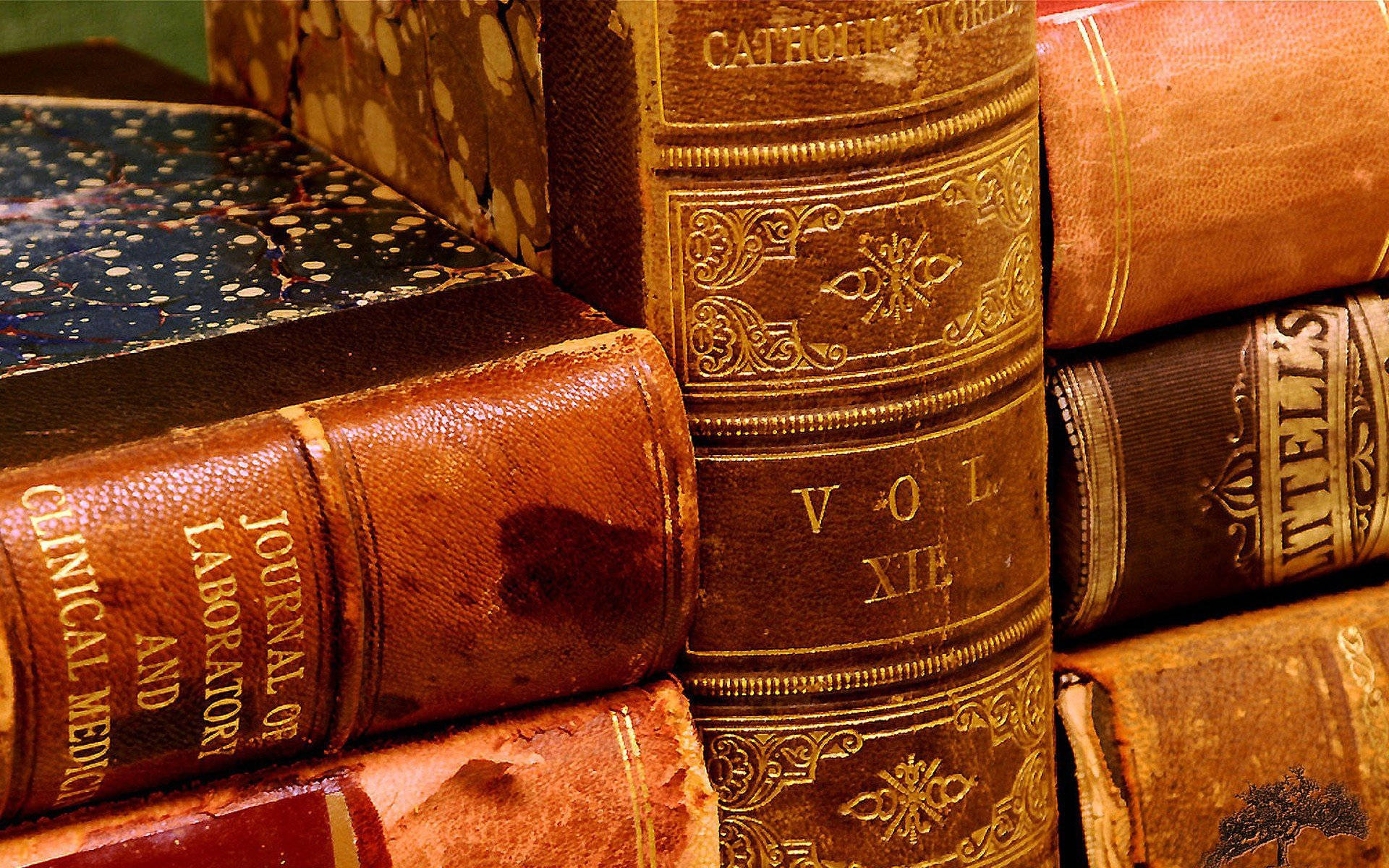 vintage leather-bound books, gold embossing, faded spines, Full HD Desktop Wallpaper