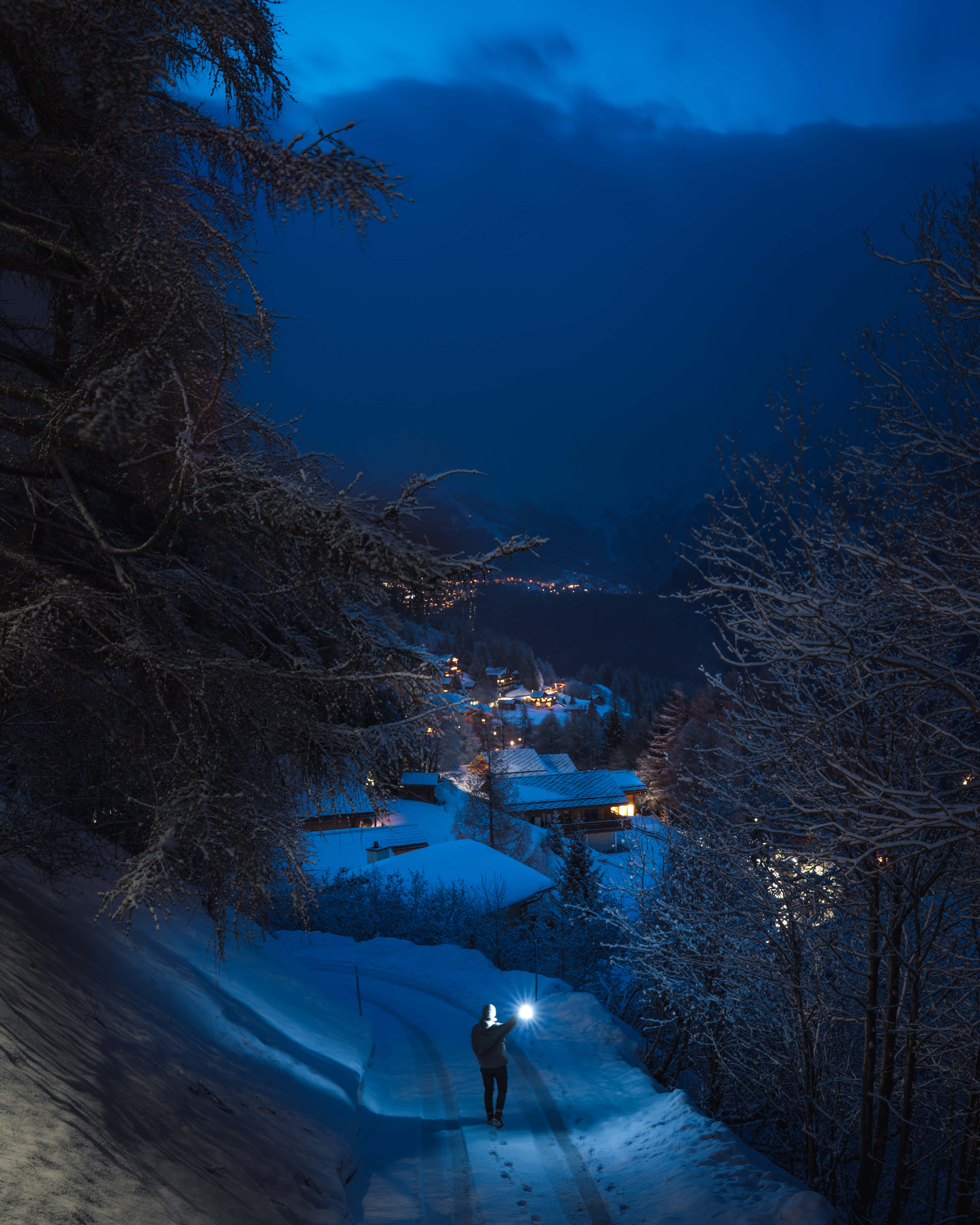 Cute Person Walking During Winter Phone, snowy mountain path, night, 5K Phone Wallpaper