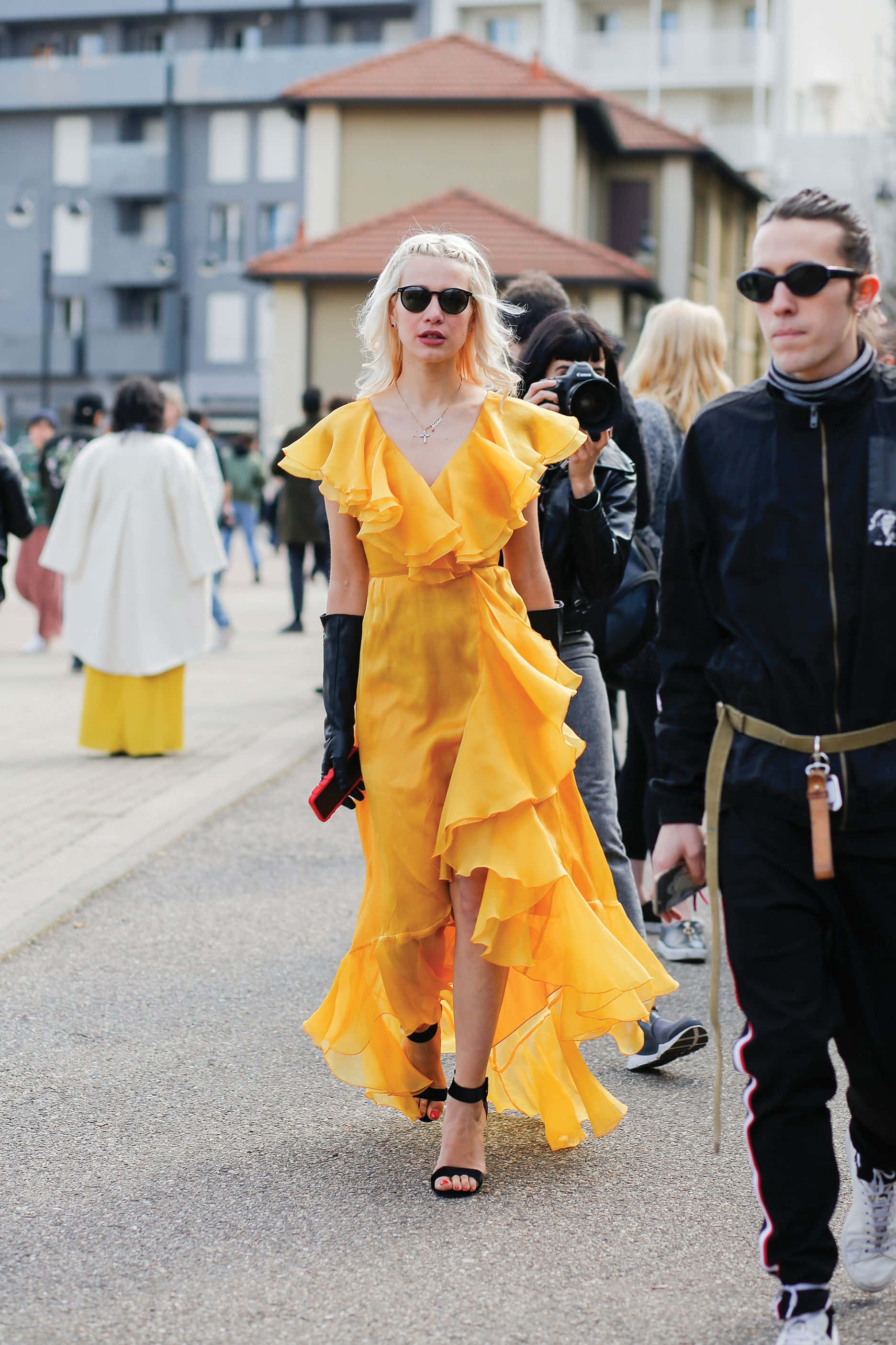 vibrant yellow ruffled dress, black gloves, city street, 2K Phone Wallpaper