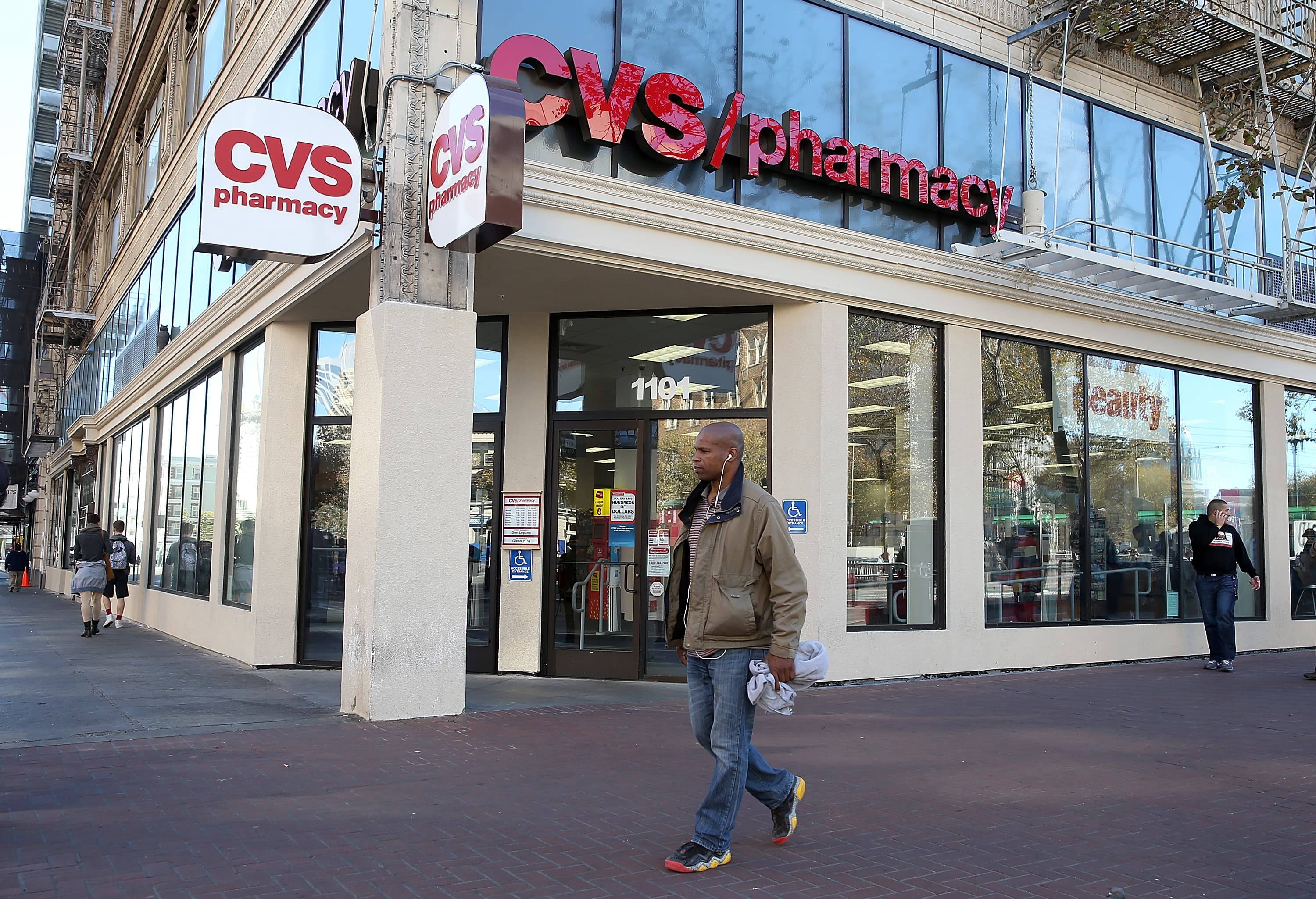 CVS, red signage, large glass windows, 2K Desktop Wallpaper