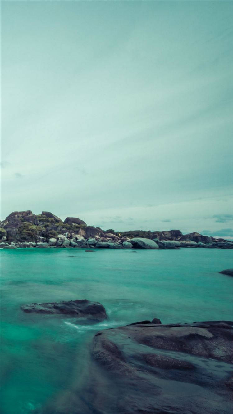 Cyan Sea And Sky, turquoise waters, dark rocks, HD Phone Wallpaper