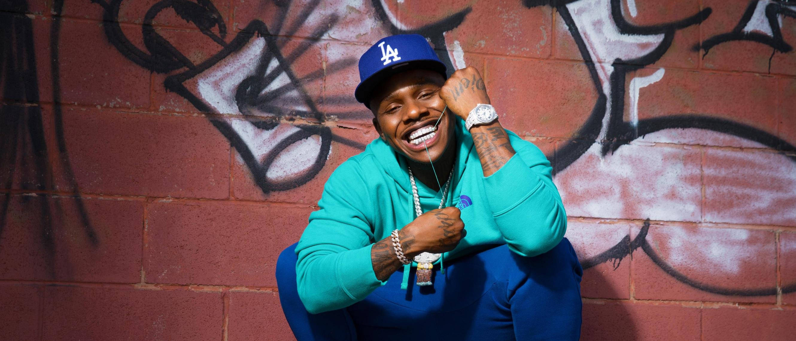 Dababy, teal jacket, blue cap, 2K Desktop Wallpaper