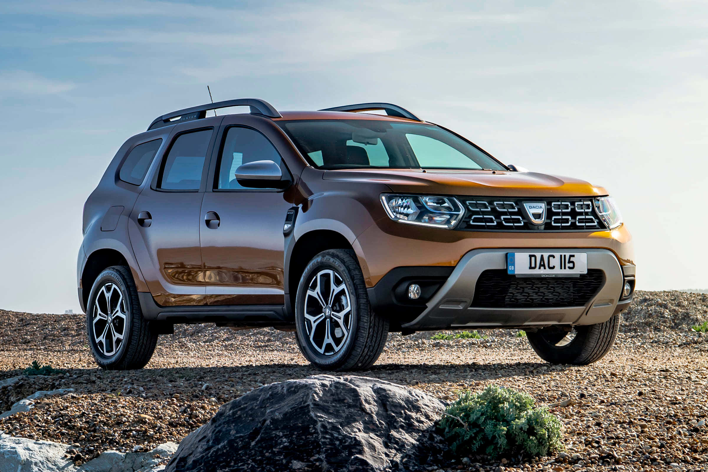Dacia Duster, bronze, rocky terrain, Full HD Desktop Wallpaper