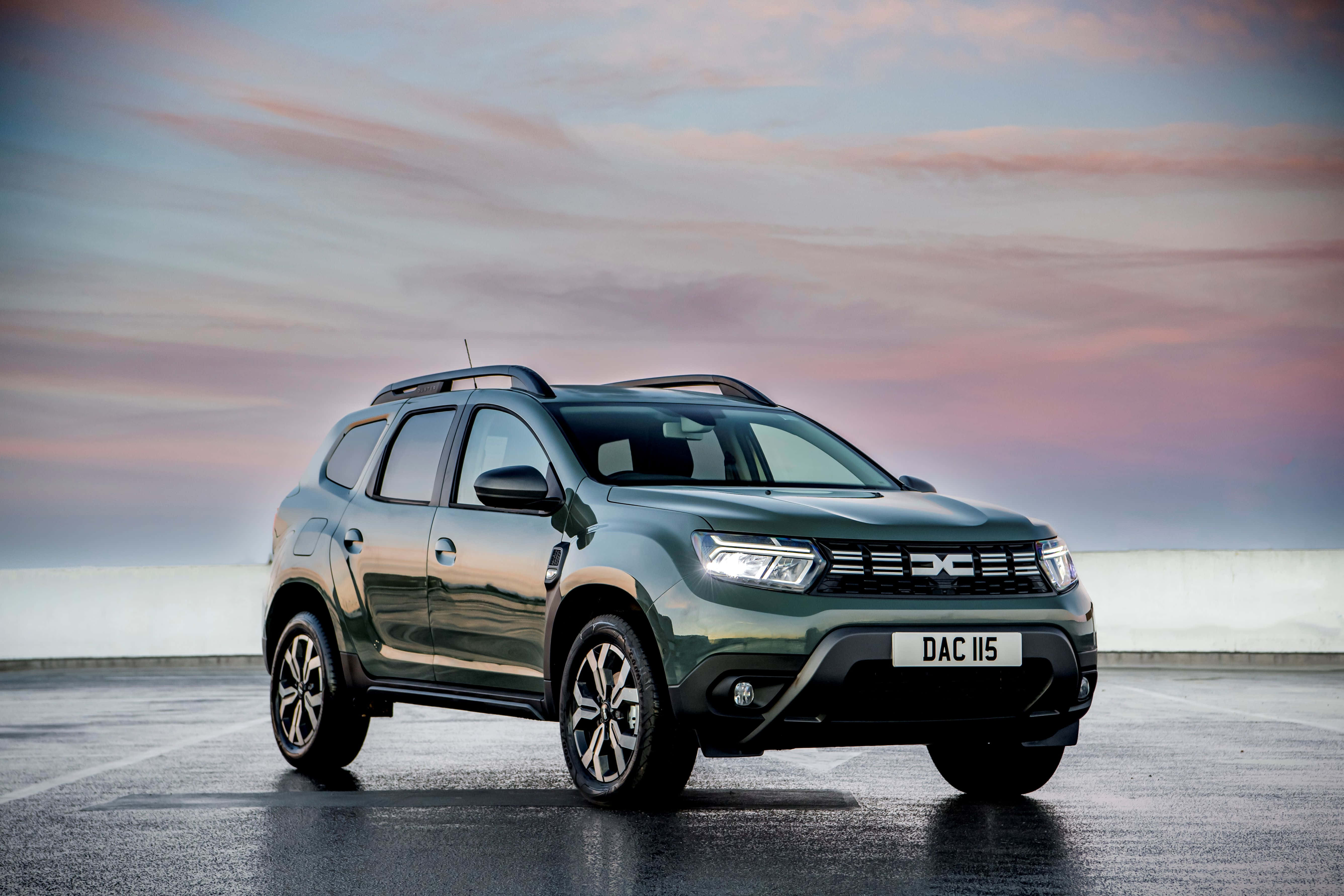 Dacia Duster, dark green, wet asphalt surface, 5K Desktop Wallpaper