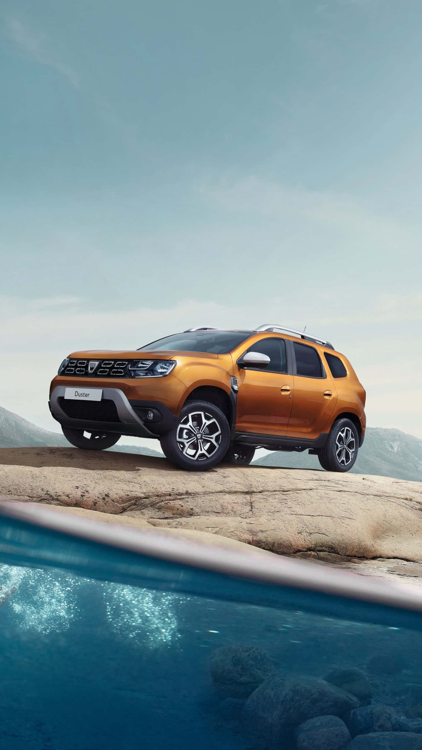Dacia Duster, mountain backdrop, vibrant orange, 2K Phone Wallpaper