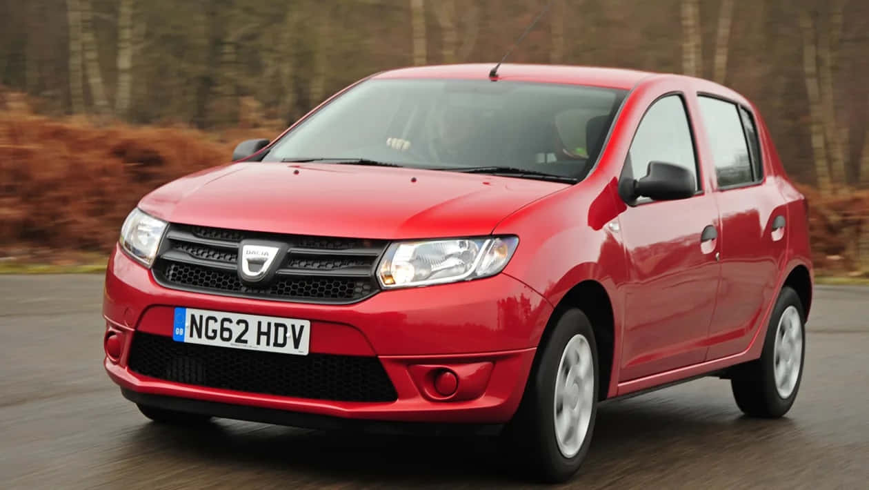 Red Dacia Sandero, hatchback, wet road, SD Desktop Wallpaper