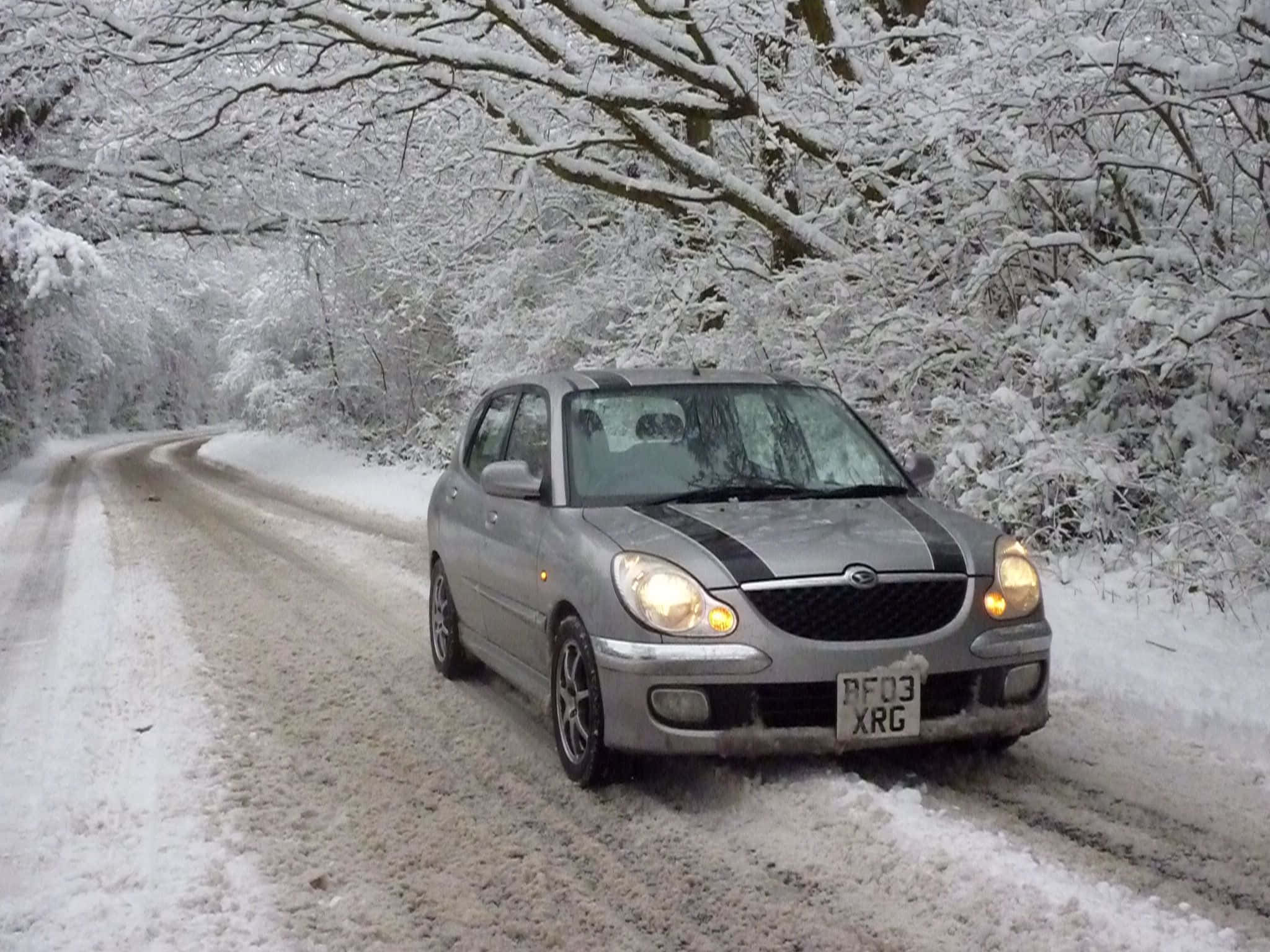 Daihatsu Sirion, grey, snow-covered forest road, Full HD Desktop Wallpaper