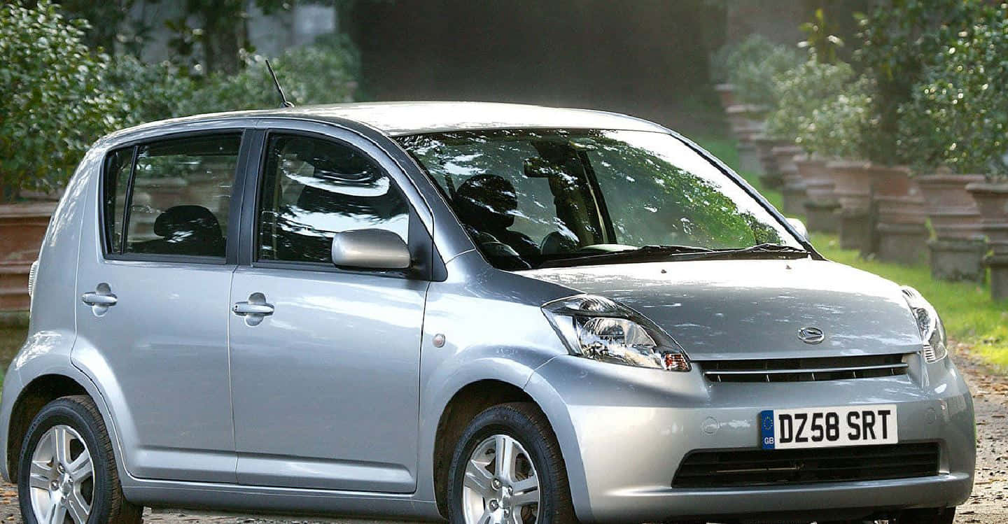 Daihatsu Sirion, silver, gravel path, HD Desktop Wallpaper