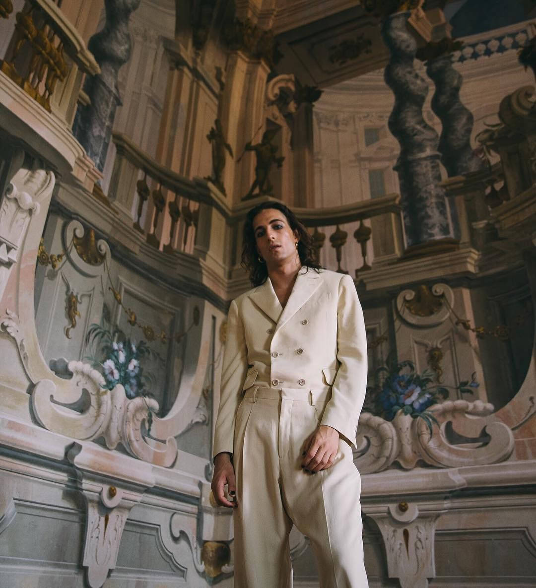 Damiano David, cream double-breasted suit, grand ornate baroque interior, SD Phone Wallpaper
