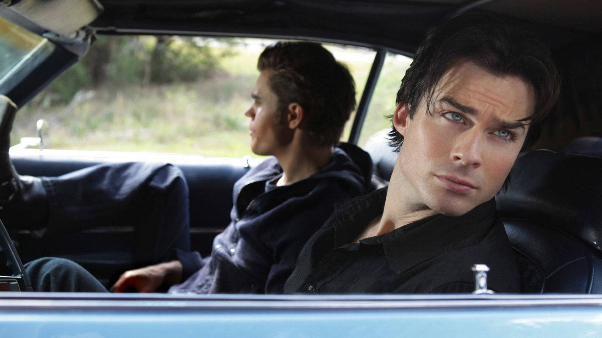 Damon Salvatore, vintage blue car, gazes intensely at the camera, Full HD Desktop Wallpaper