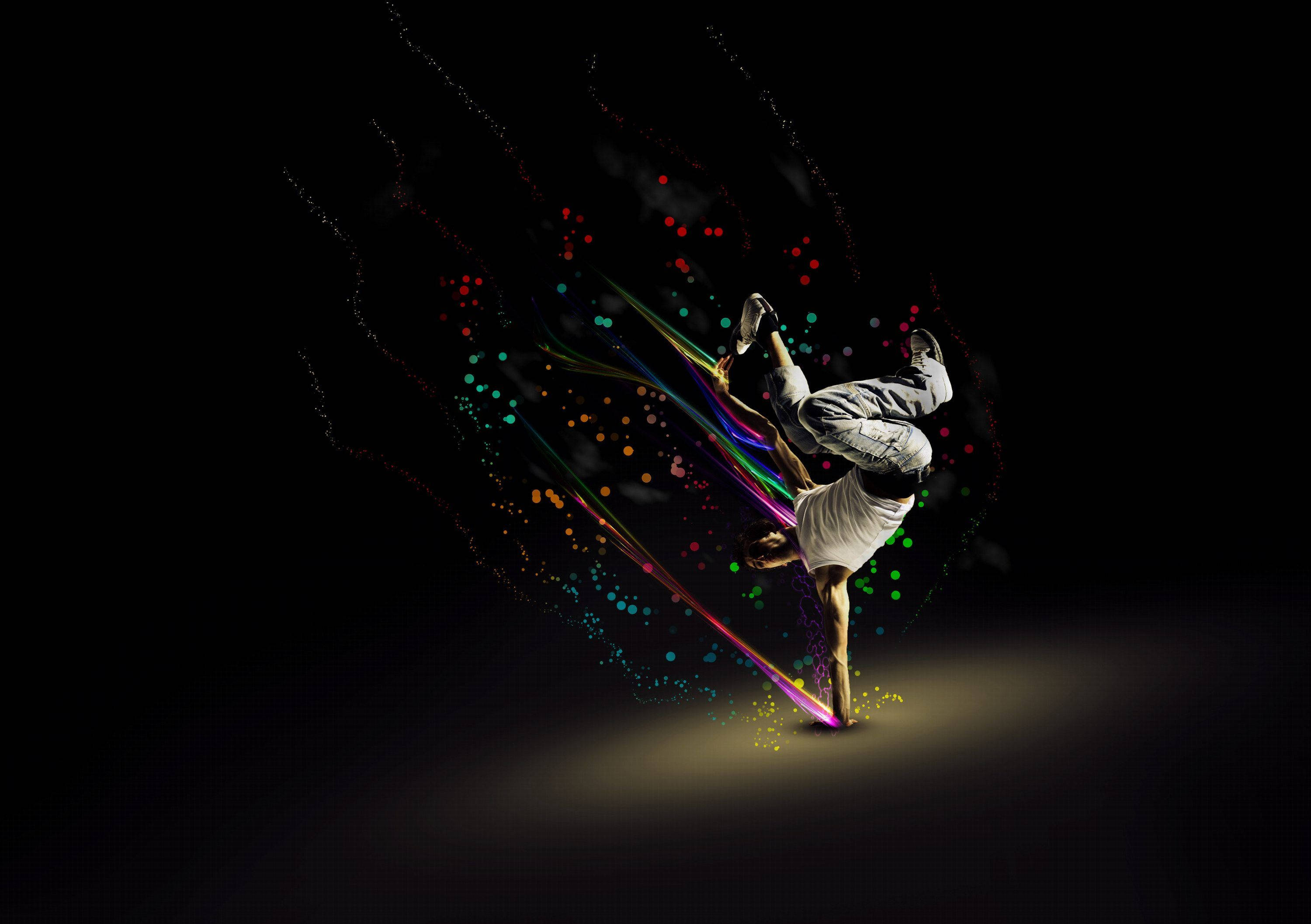 breakdancer, handstand spin, black background, 2K Desktop Wallpaper