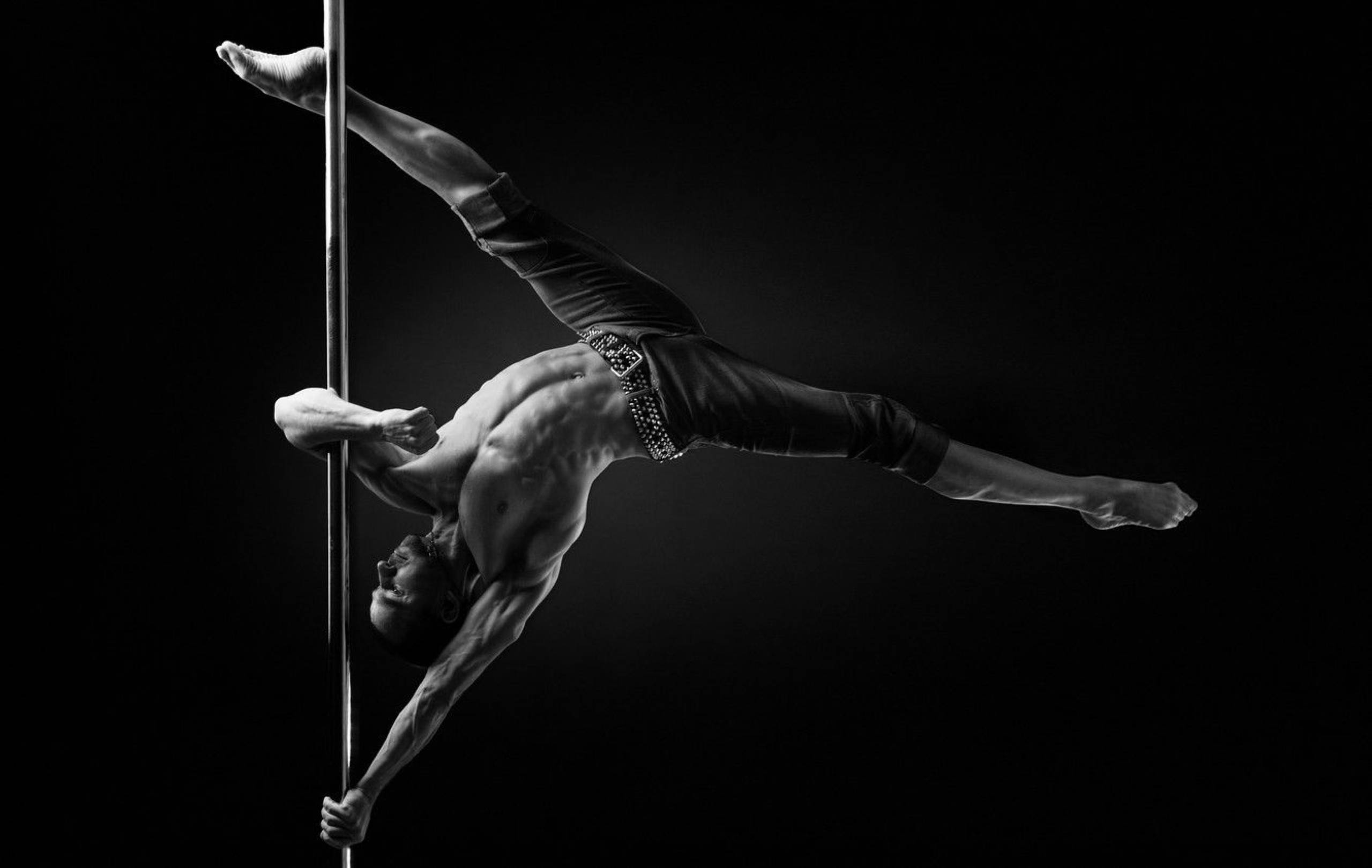 man, pole dance, black background, 2K Desktop Wallpaper