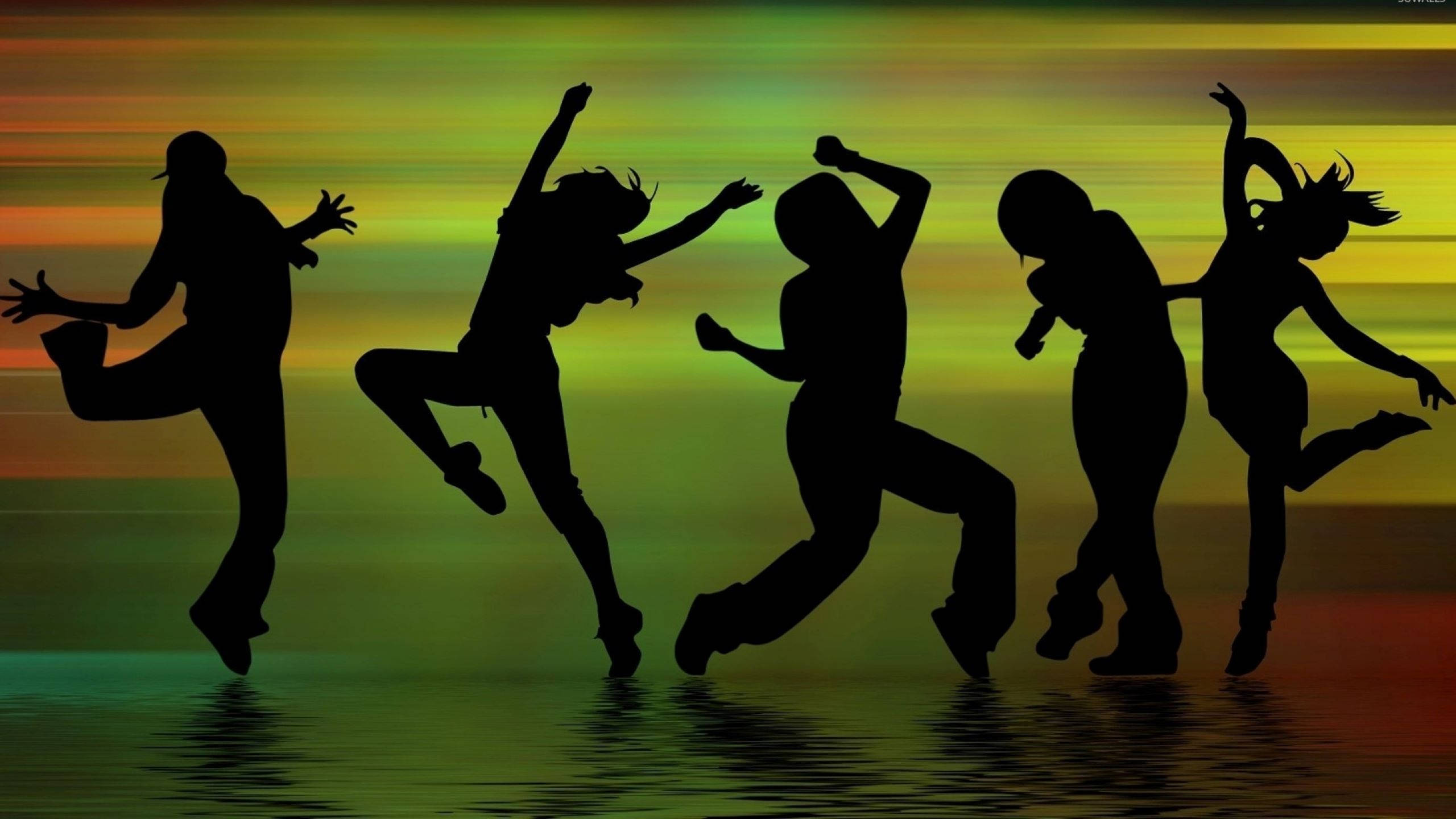 silhouetted dancers, vibrant gradient sunset sky, water, 2K Desktop Wallpaper