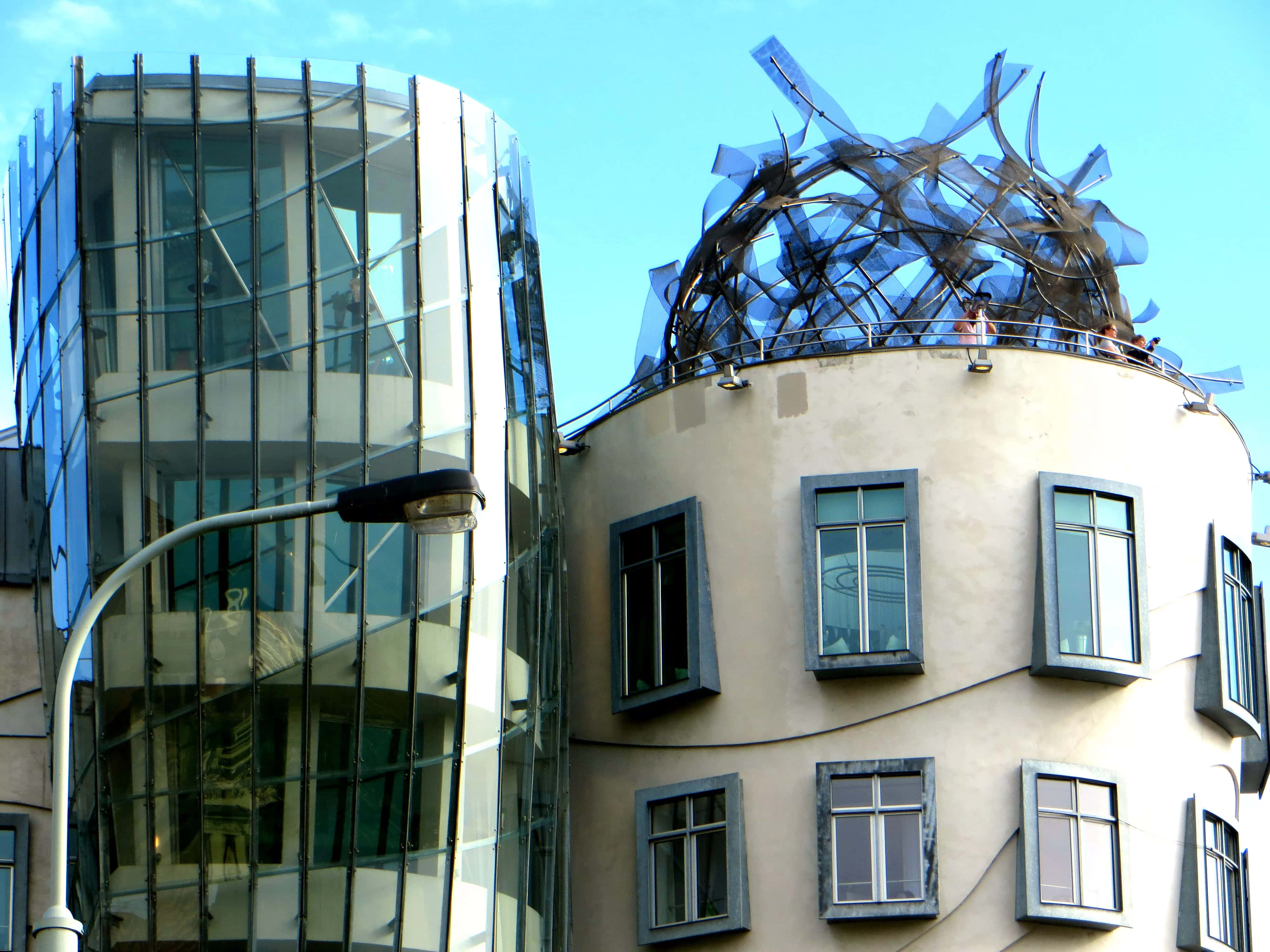 Dancing House, blue-tinted metal sculpture, curved roof, 4K Desktop Wallpaper