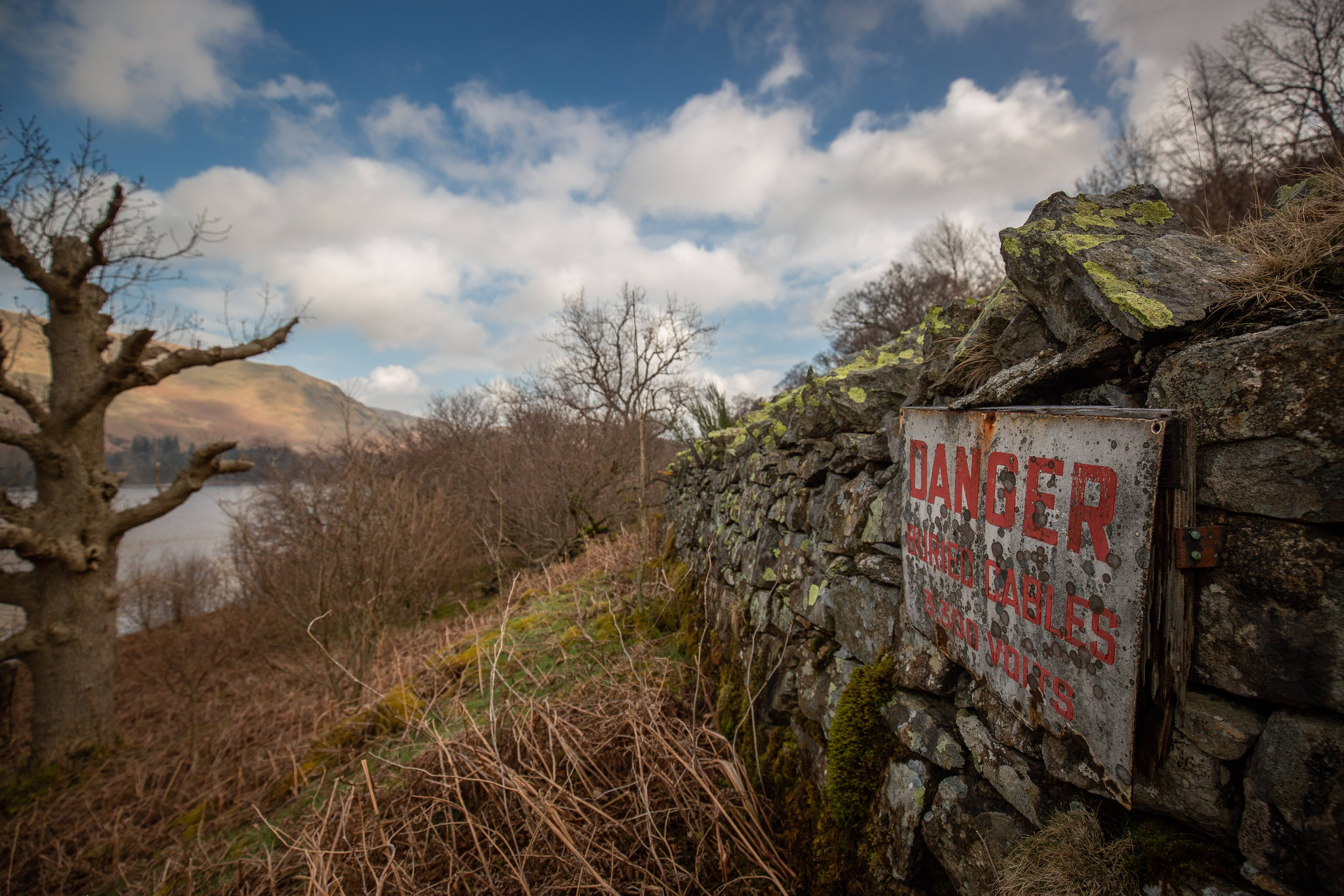 old danger sign, mossy stone wall, tranquil lake, 5K Desktop Wallpaper