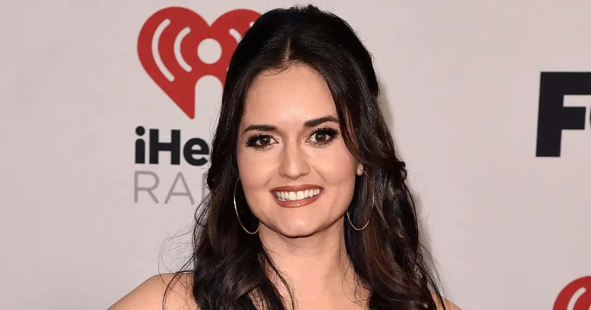 Danica McKellar, iHeartRadio event, branded backdrop, SD Desktop Wallpaper