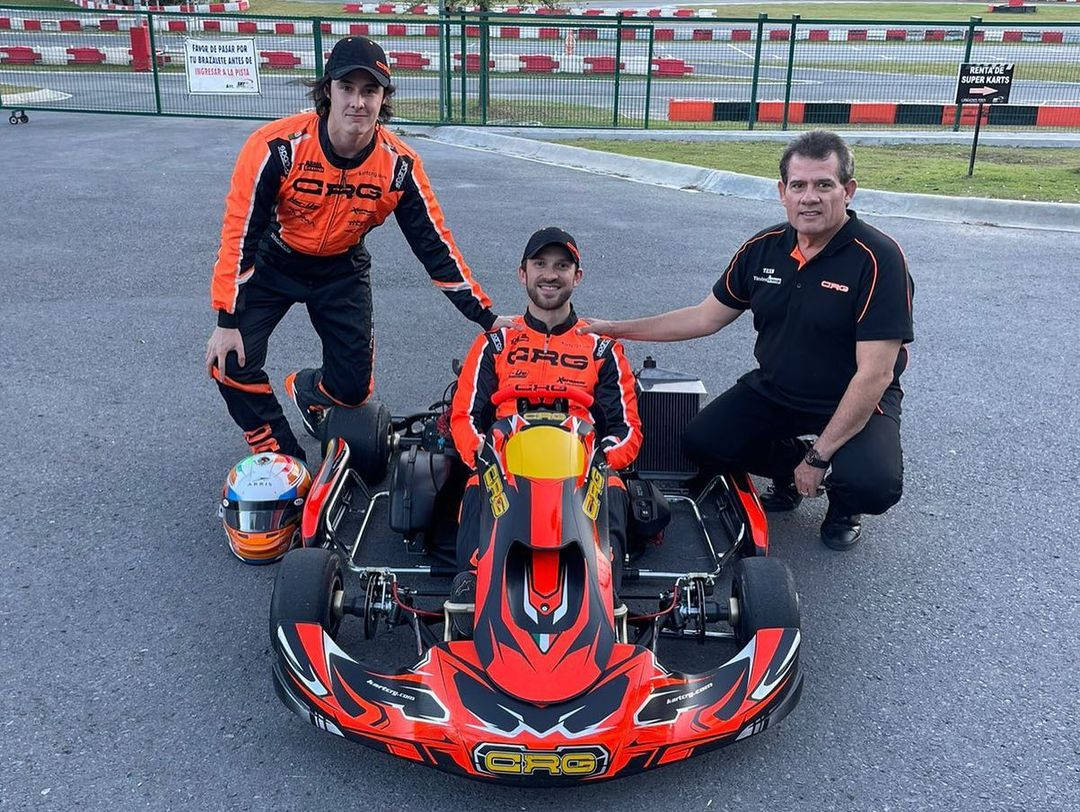 Daniel Suarez, orange racing gear, red and black CRG go-kart, SD Desktop Wallpaper
