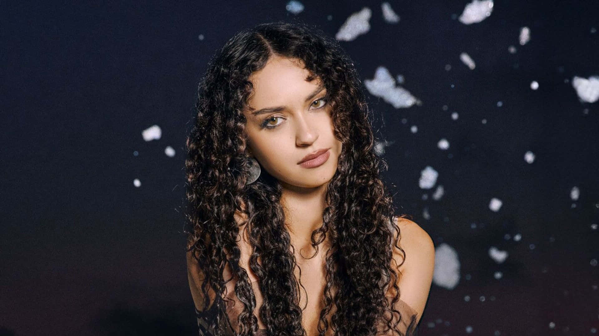 Daniela Katseye, long dark curly hair, dark backdrop, Full HD Desktop Wallpaper