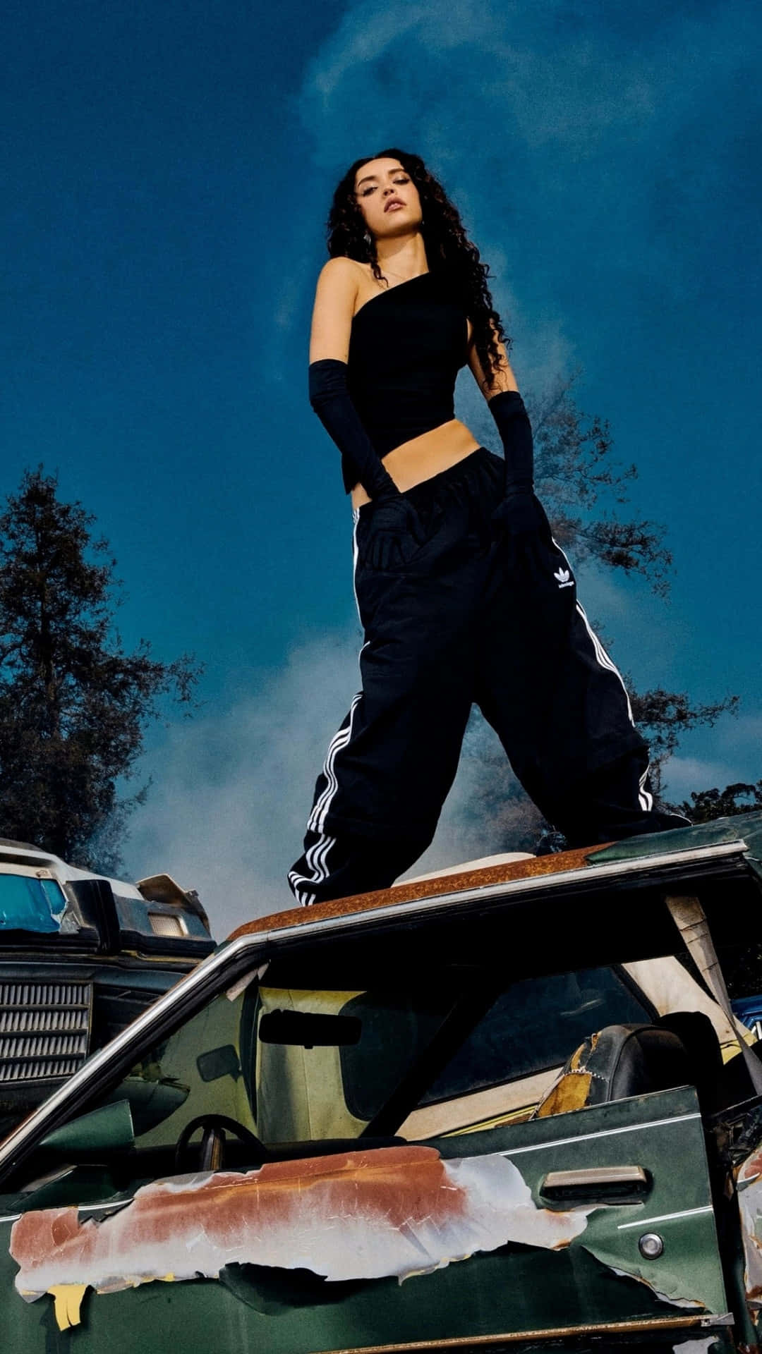 Daniela Katseye, black athletic wear, rusted green car, Full HD Phone Wallpaper