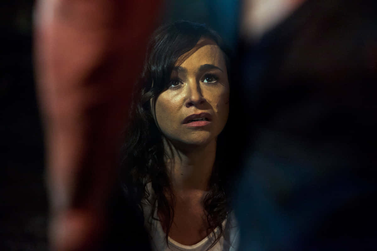 Danielle Harris, dark hair, dimly lit space, SD Desktop Wallpaper