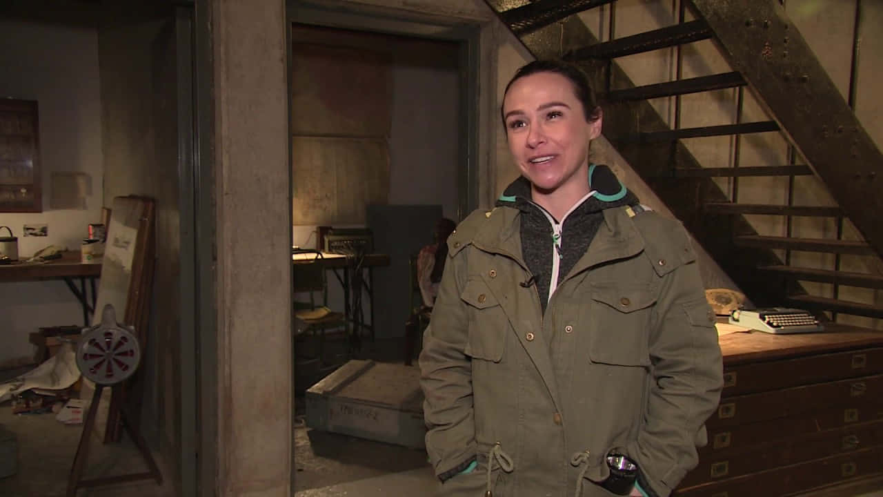 Danielle Harris, olive jacket, dimly lit basement, HD Desktop Wallpaper