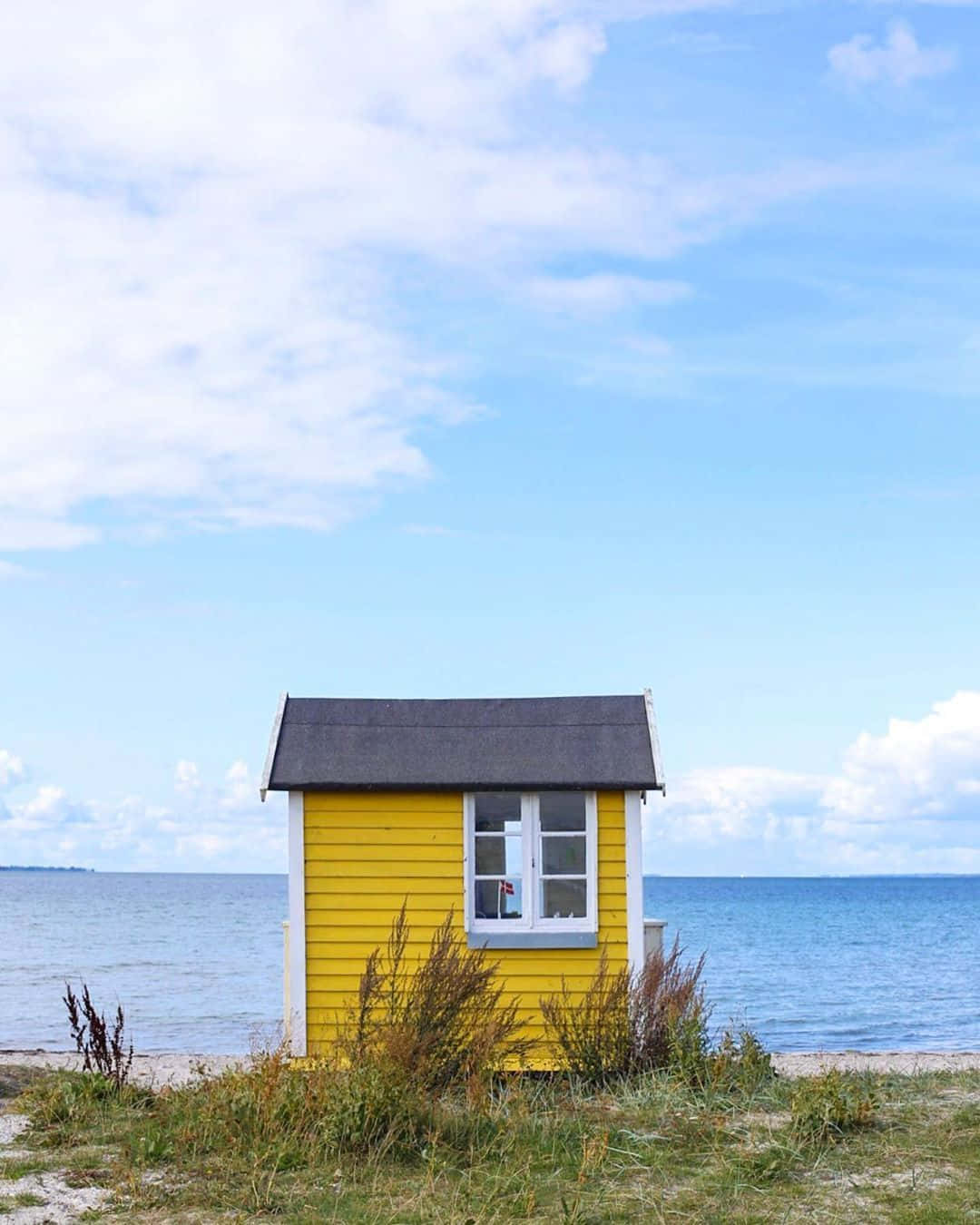 yellow beach hut, white trim, grassy shore, HD Phone Wallpaper