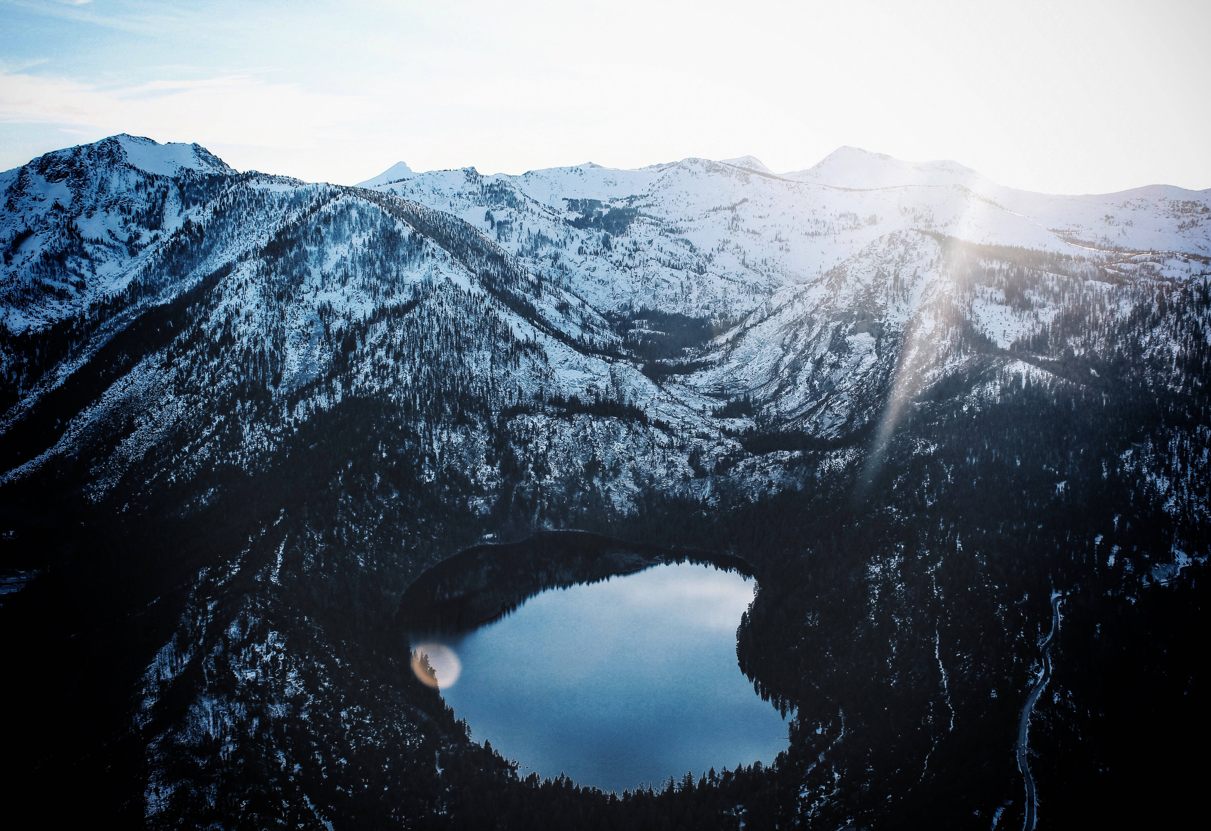 Majestic Lake, snow covered mountain lake, soft glow of sunrise, 4K Desktop Wallpaper