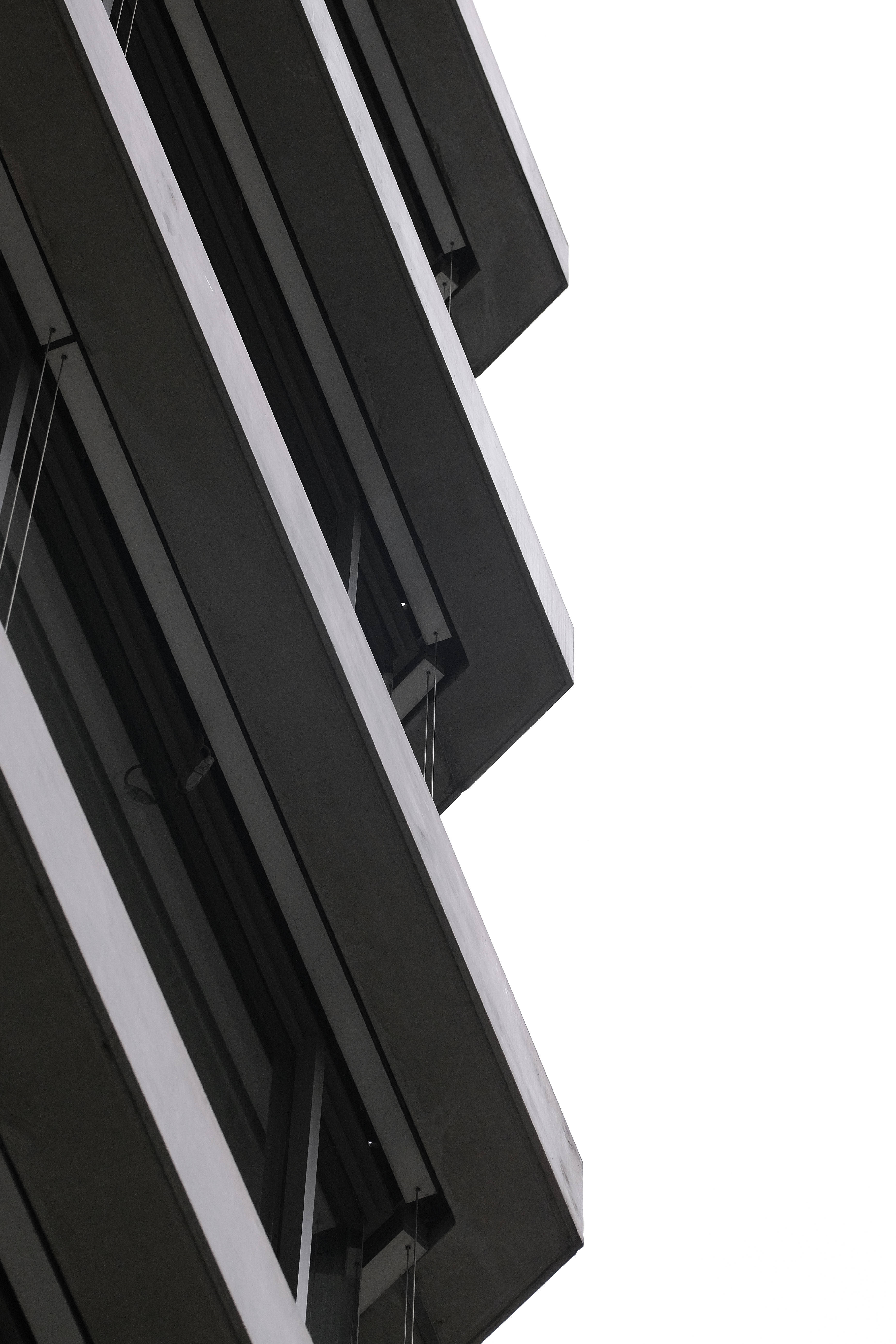 modern facade, black and white geometric lines, bright white sky, 5K Phone Wallpaper