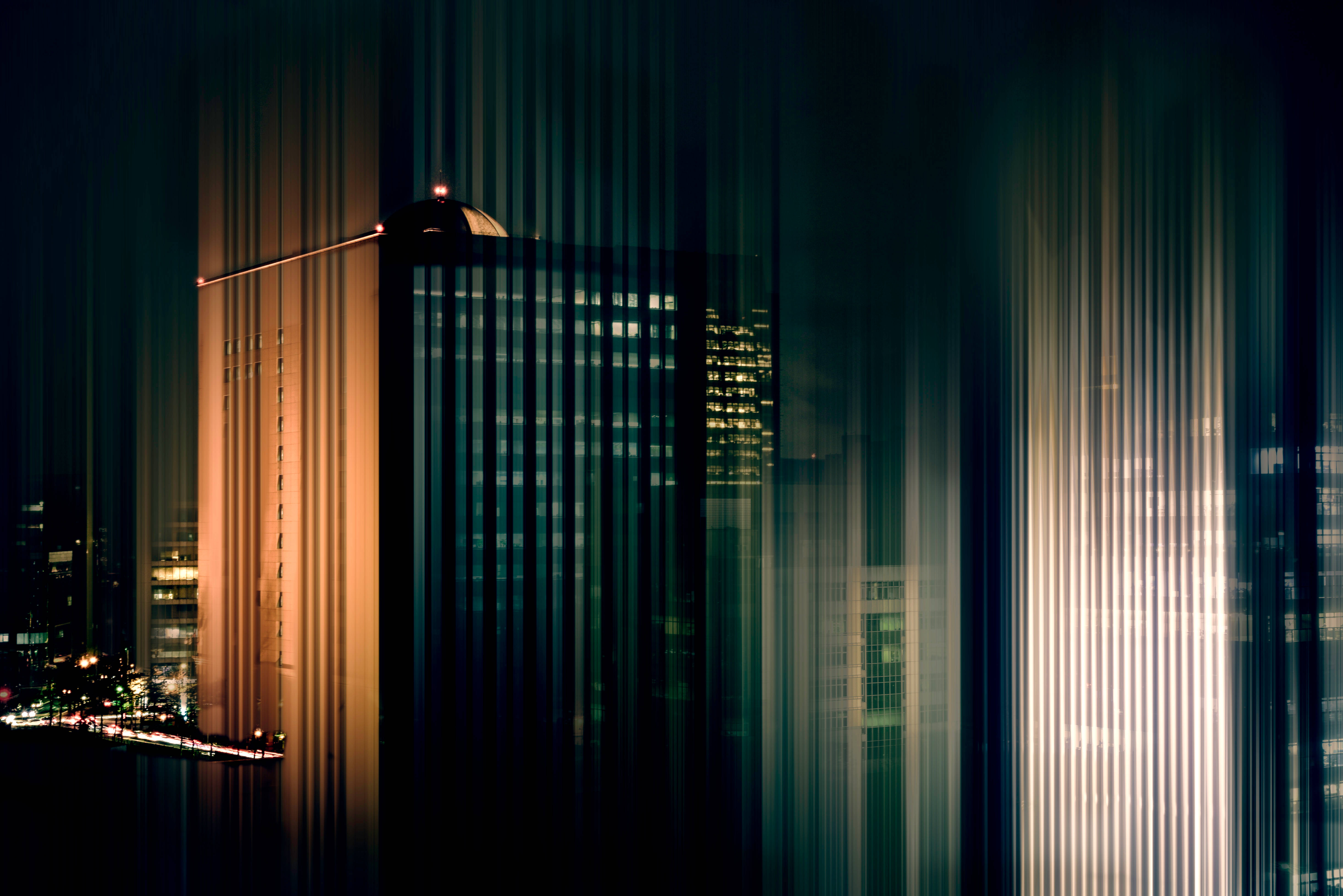 city buildings, night, vertical light streaks, 5K Desktop Wallpaper