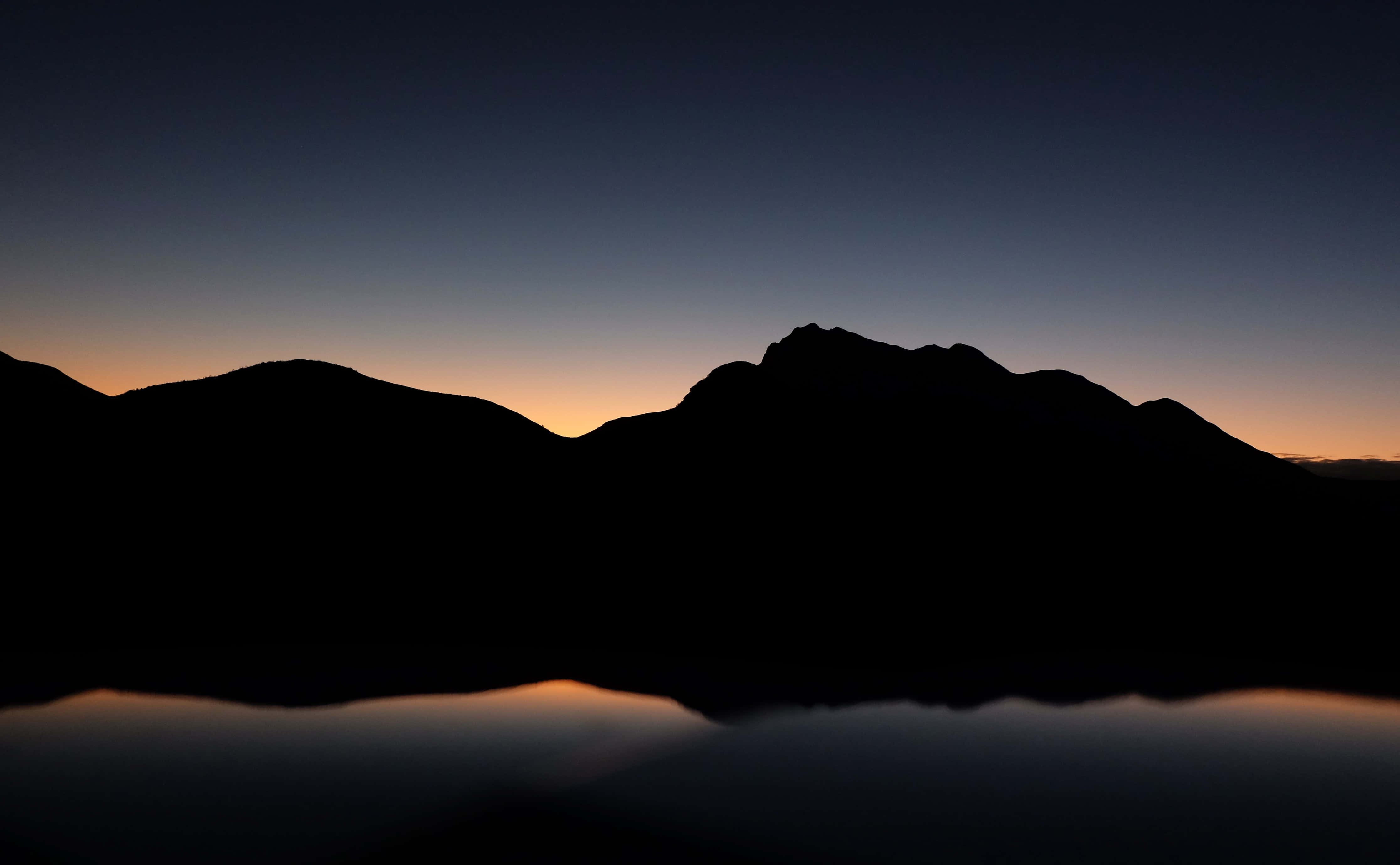 silhouetted mountains, calm water, twilight, 4K Desktop Wallpaper