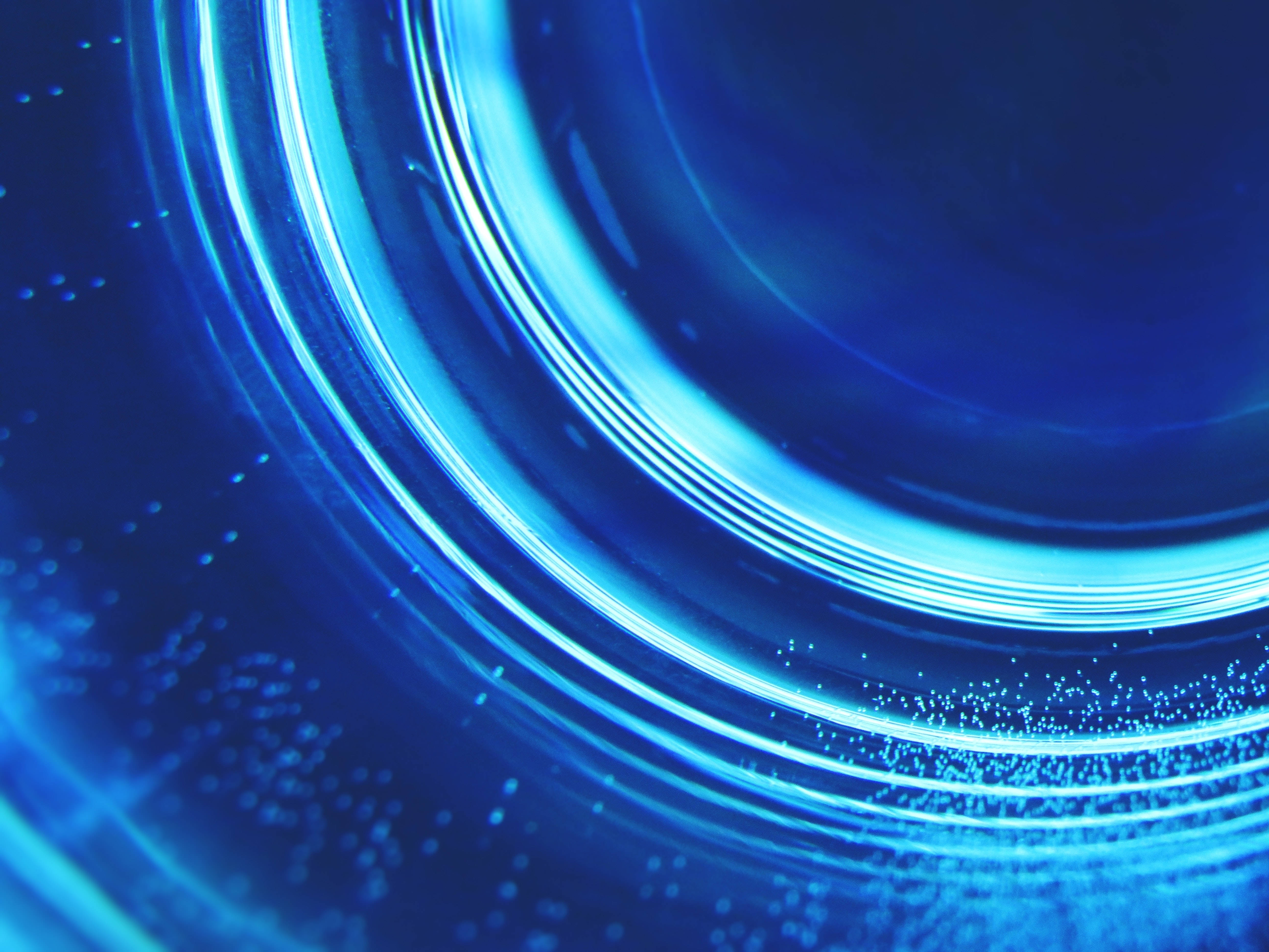 futuristic rings, dark and blue aesthetic, vibrant blue concentric light rings, 5K Desktop Wallpaper