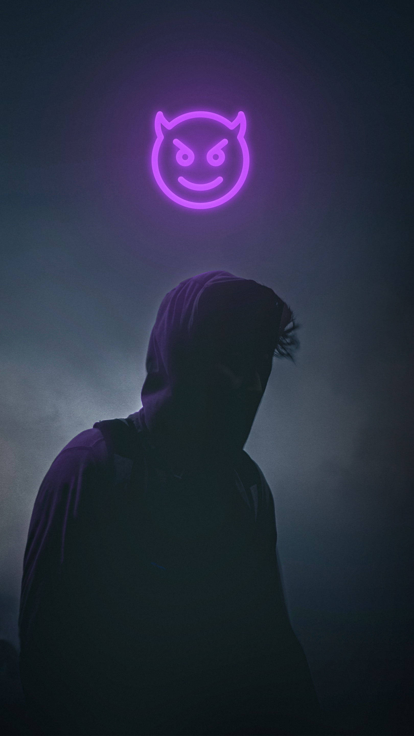 hooded figure, glowing purple devil emoji neon sign, smoky dark room, 2K Phone Wallpaper
