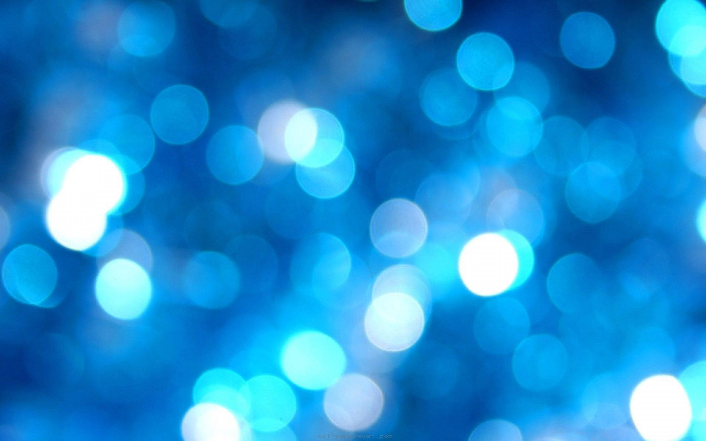 blue aesthetic tumblr, glowing blue bokeh lights, deep blue background, 2K Desktop Wallpaper