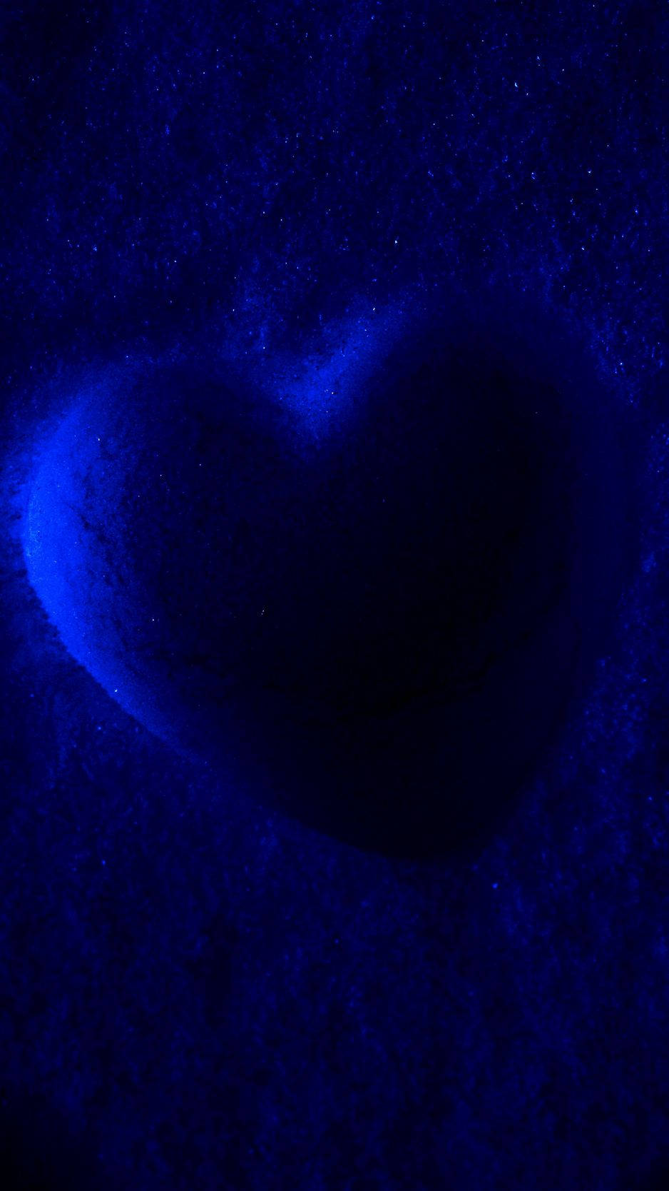 Dark Blue iPhone, glowing blue heart shape, textured dark blue background, HD Phone Wallpaper