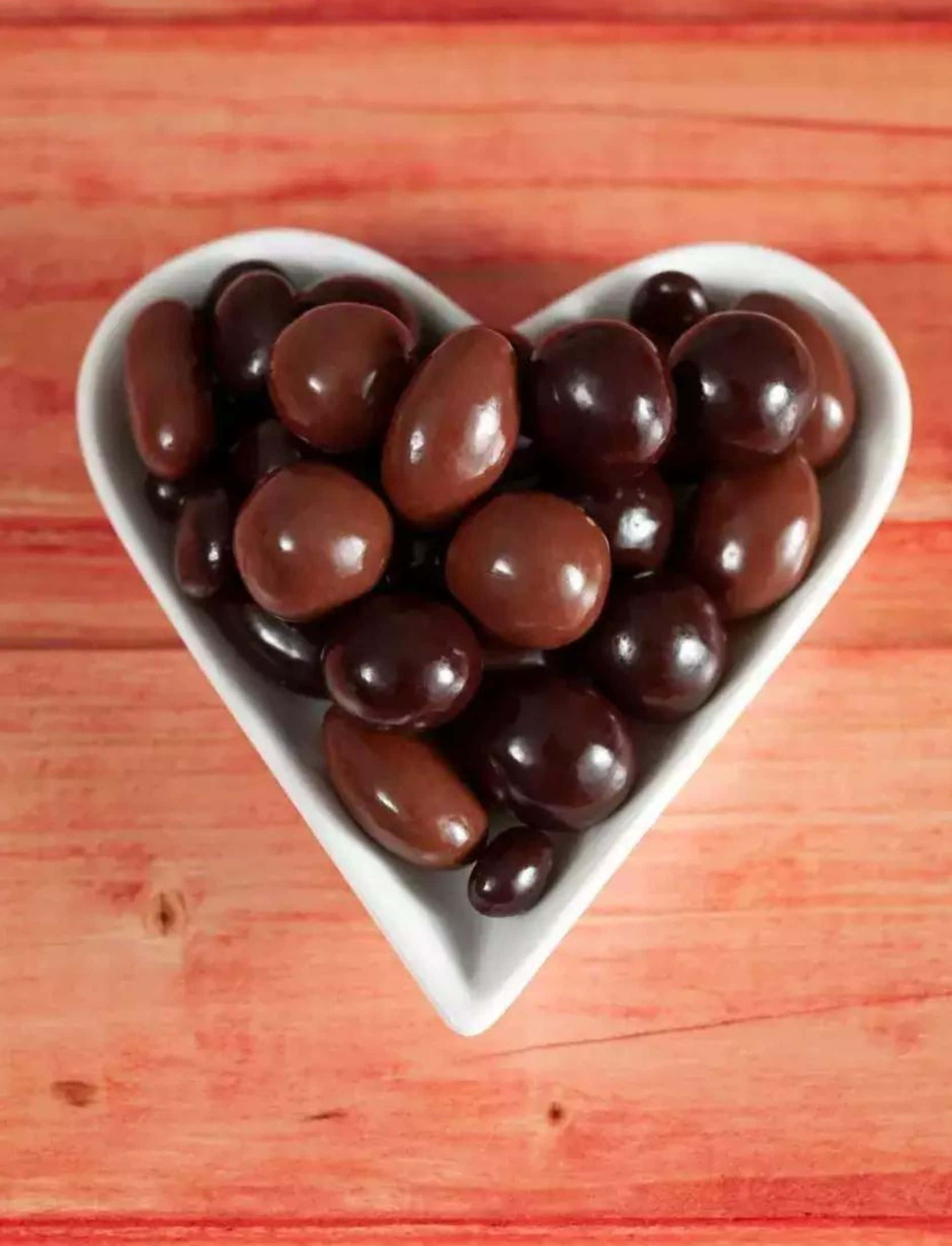 dark chocolate, white heart-shaped bowl, glossy dark chocolate candies, Full HD Phone Wallpaper