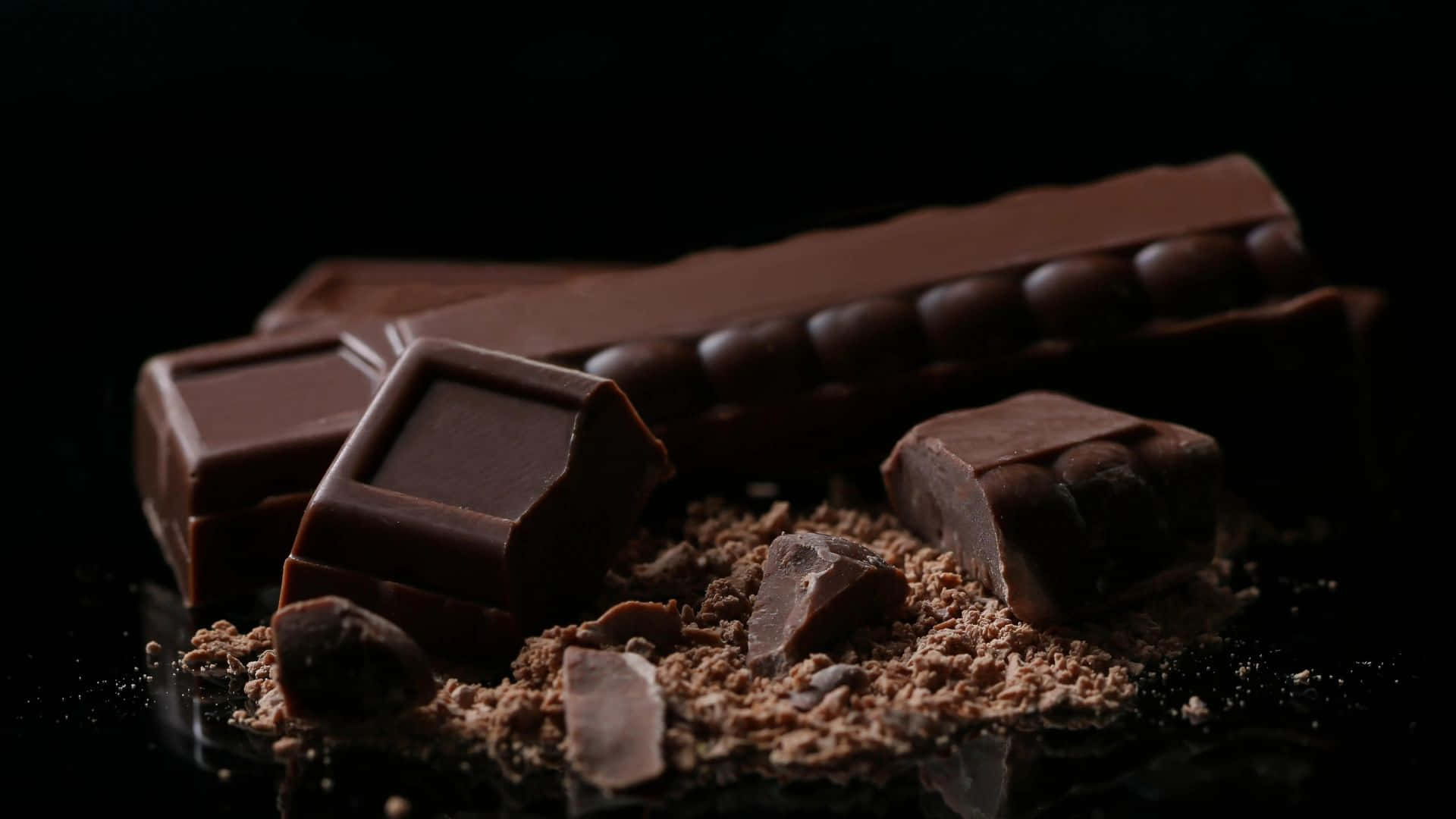 Dark Chocolate, glossy black surface, dramatic lighting, Full HD Desktop Wallpaper