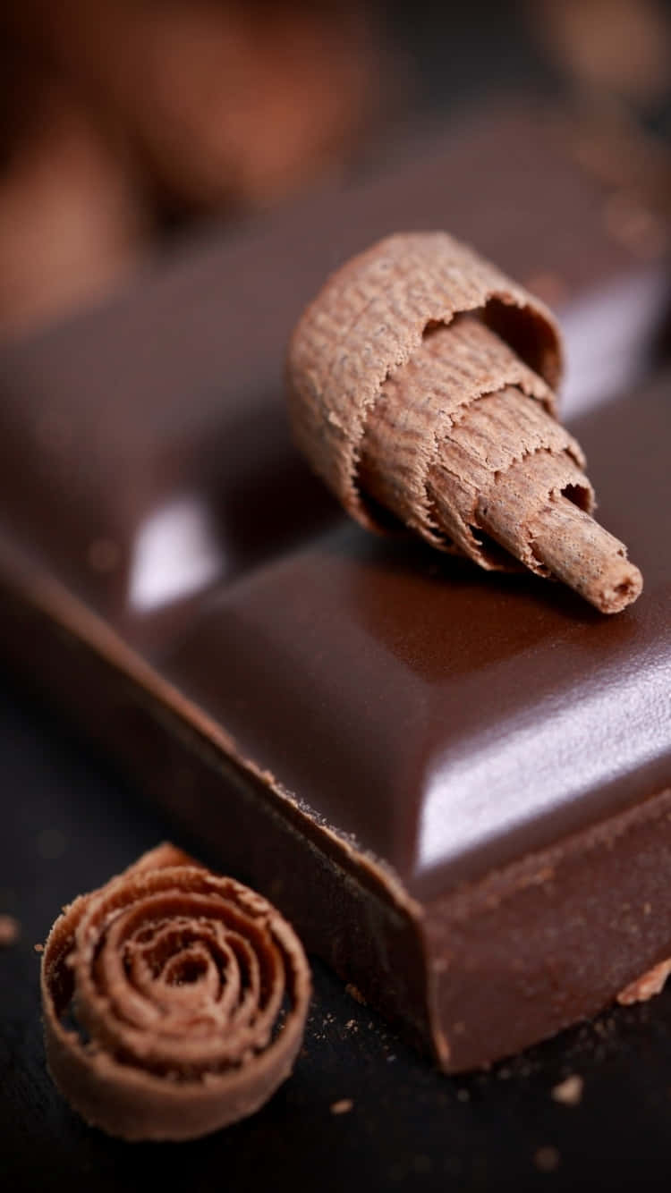 decadent chocolate, glossy dark chocolate bar, delicate cocoa curls, HD Phone Wallpaper